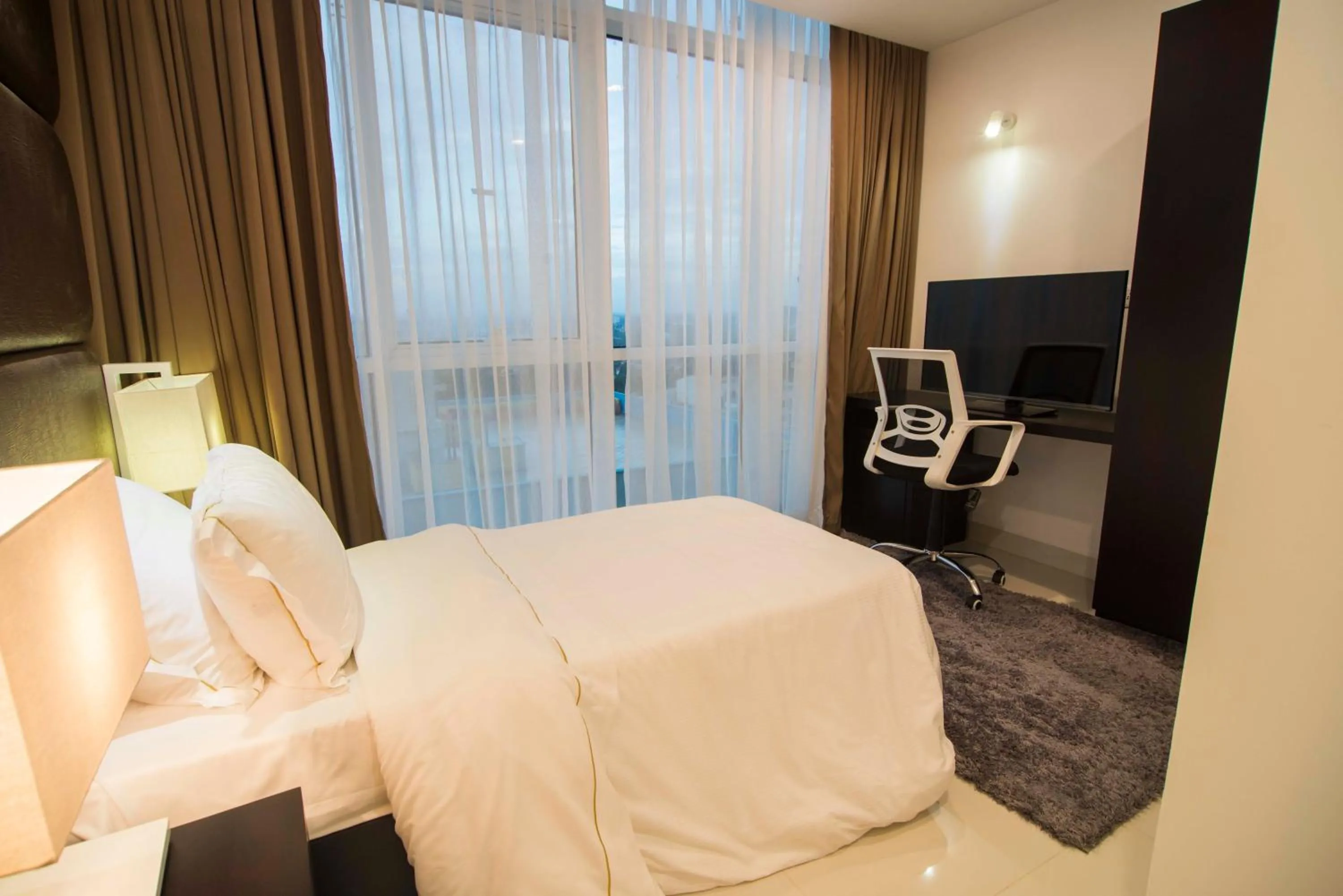 Bedroom in Platinum One Suites