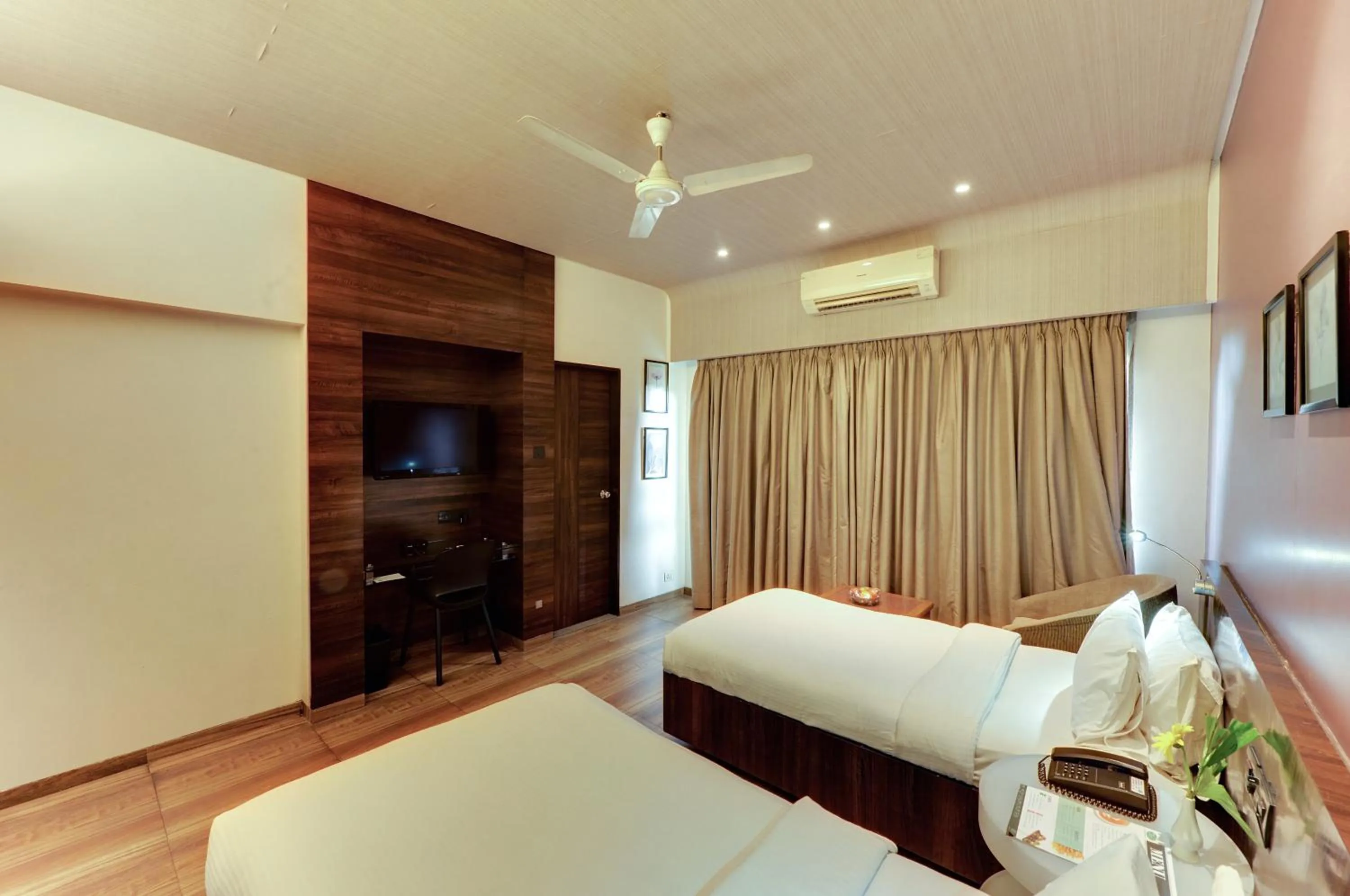 Bed in Hotel Sankam Residency
