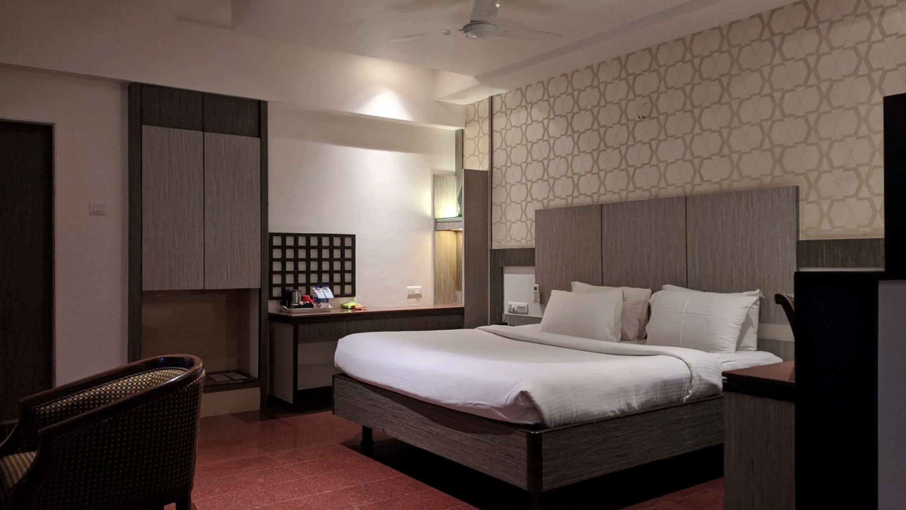 Bed in Hotel Sankam Residency