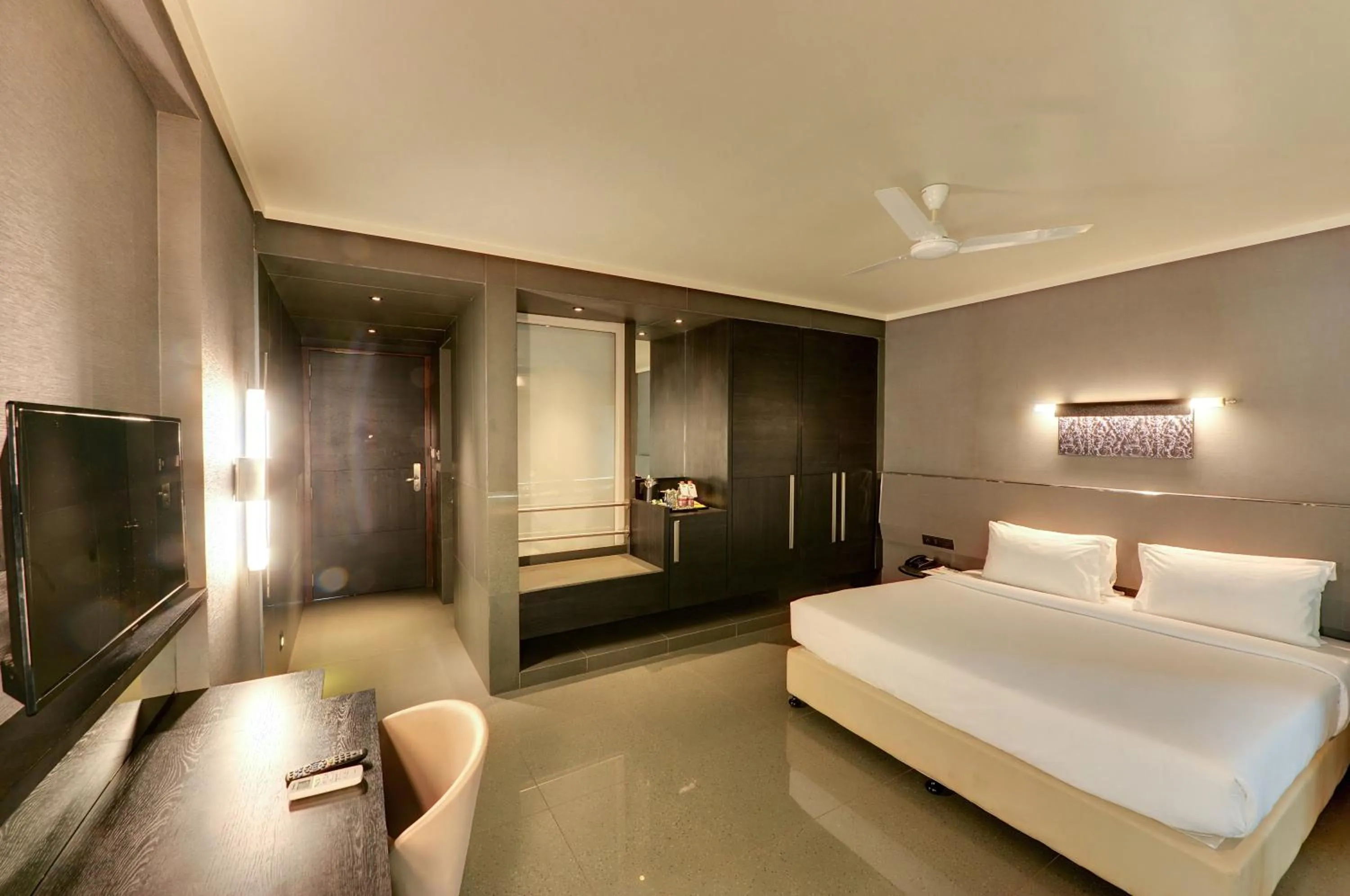 wardrobe, Bed in Hotel Sankam Residency