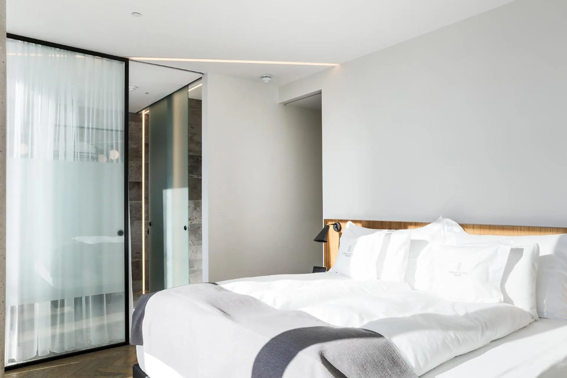 Bed in Tower Suites Reykjavík