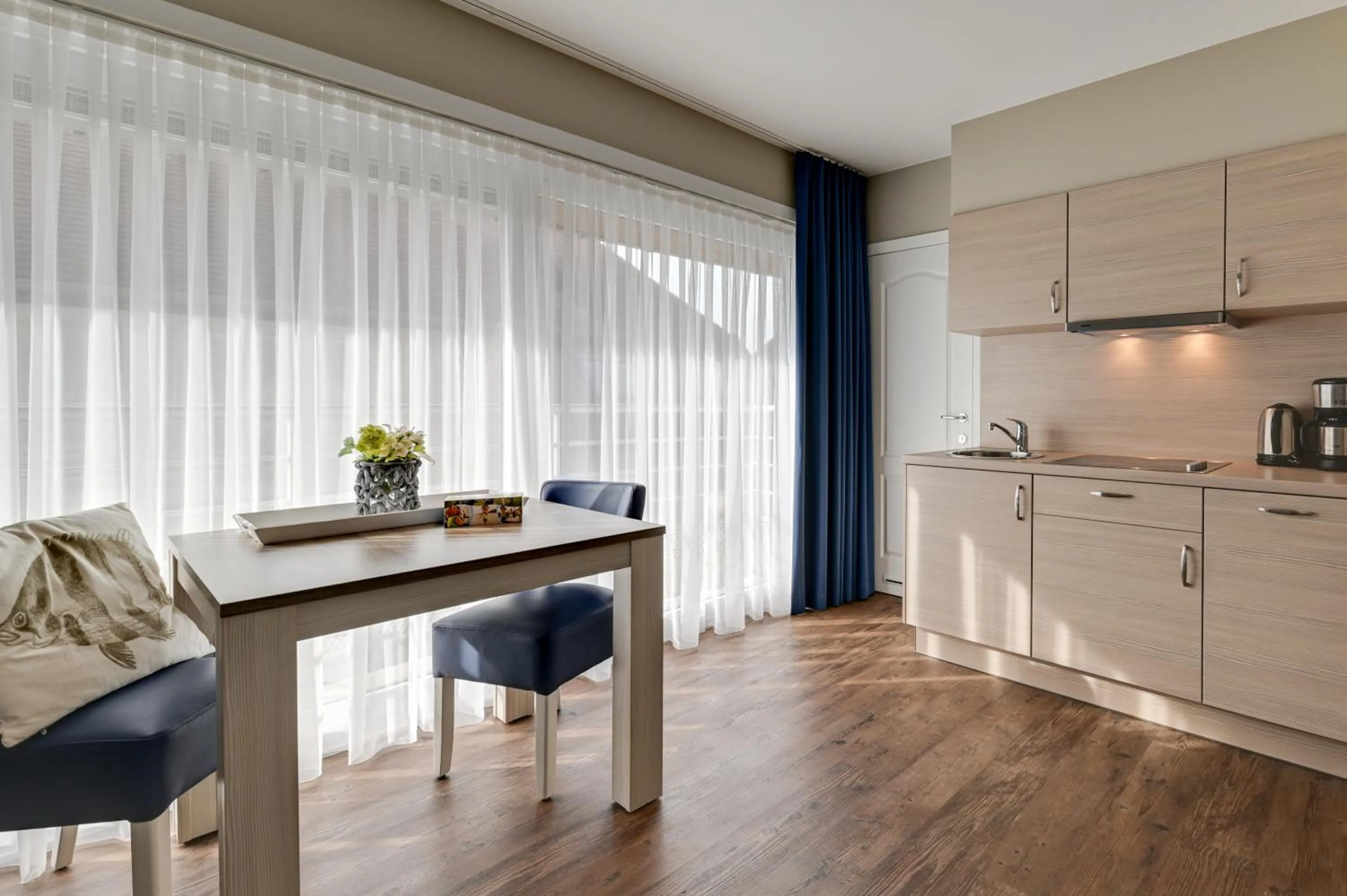 Kitchen or kitchenette in Holiday Suites De Haan