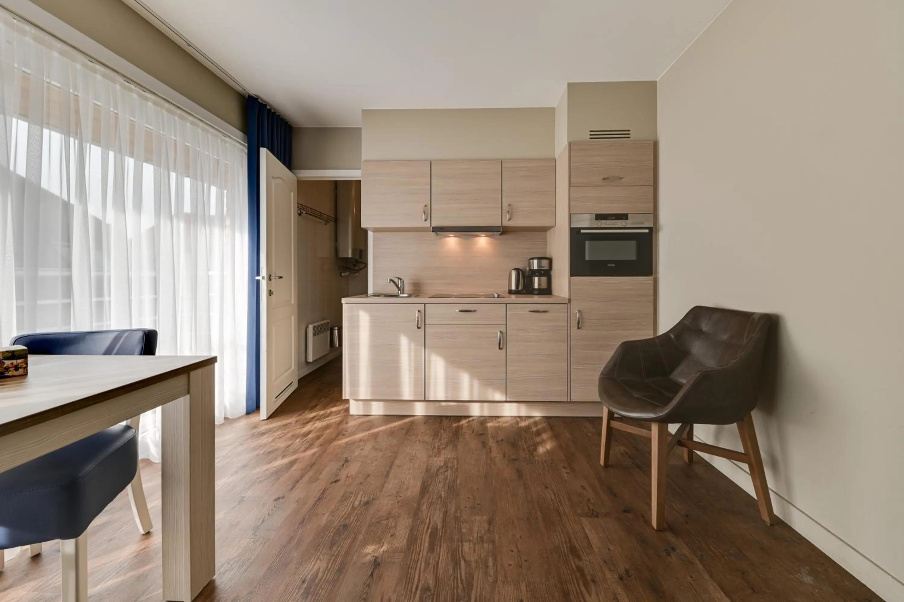 Kitchen or kitchenette in Holiday Suites De Haan