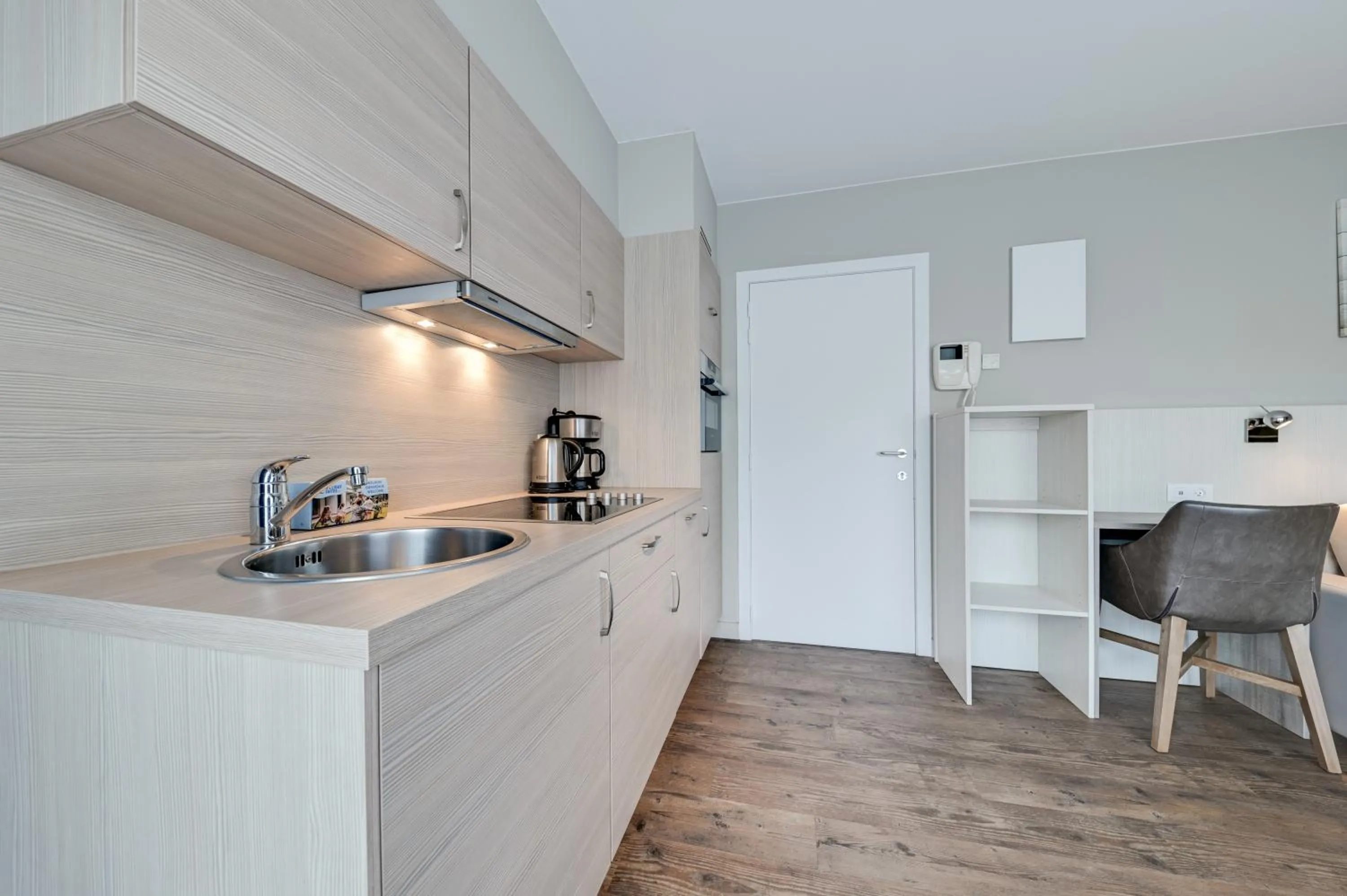 Kitchen or kitchenette in Holiday Suites De Haan