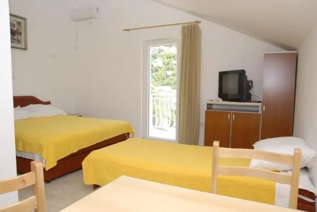 Bed in Apartments Dosljak