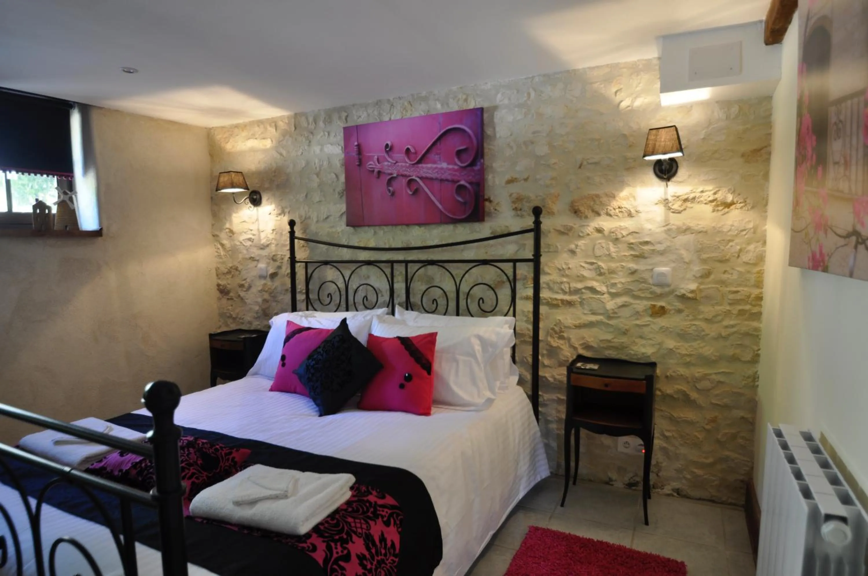 Bed in Chez Fins Bois