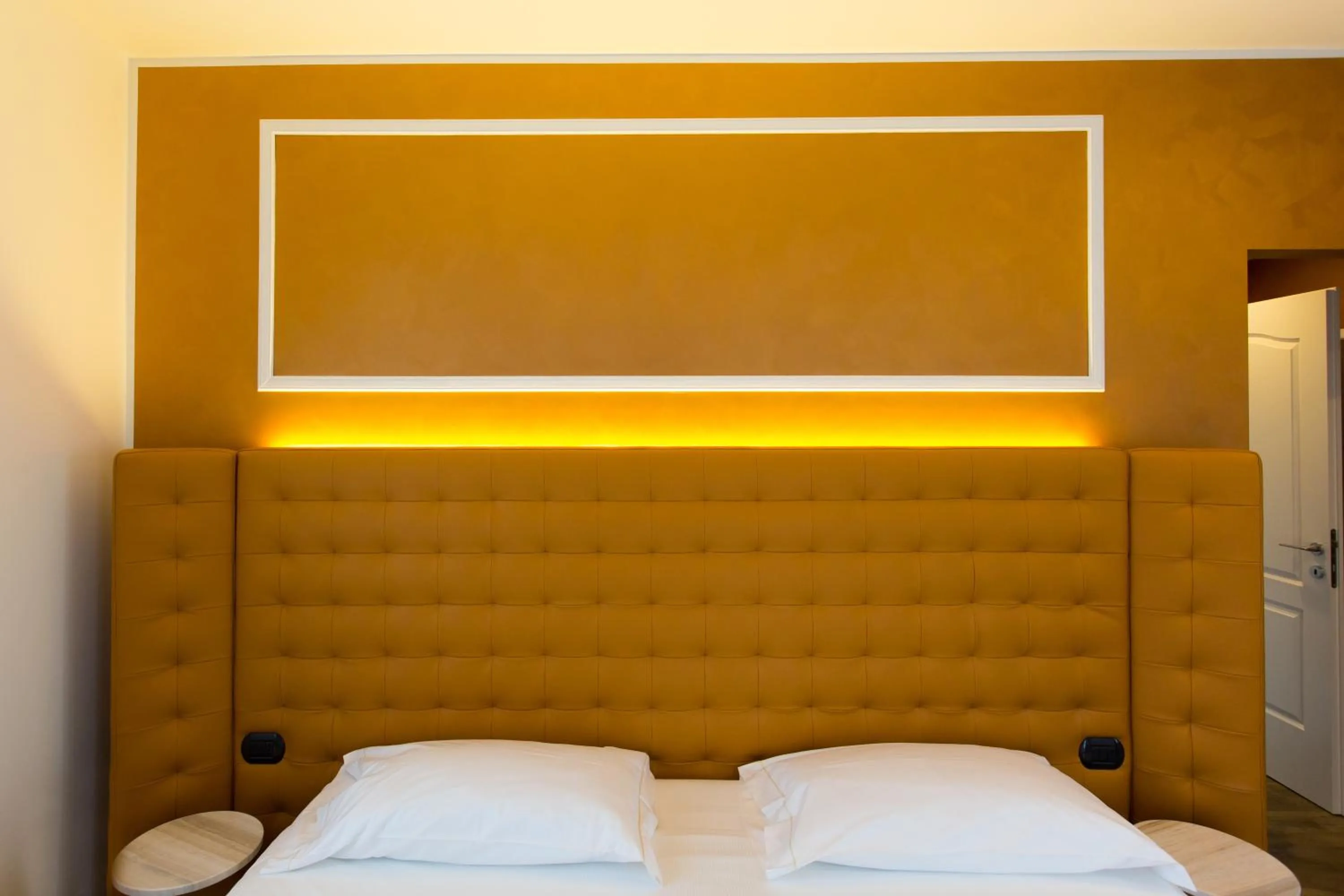 Bedroom, Bed in Hotel Al Campanile - Luxury Suites & Apartments