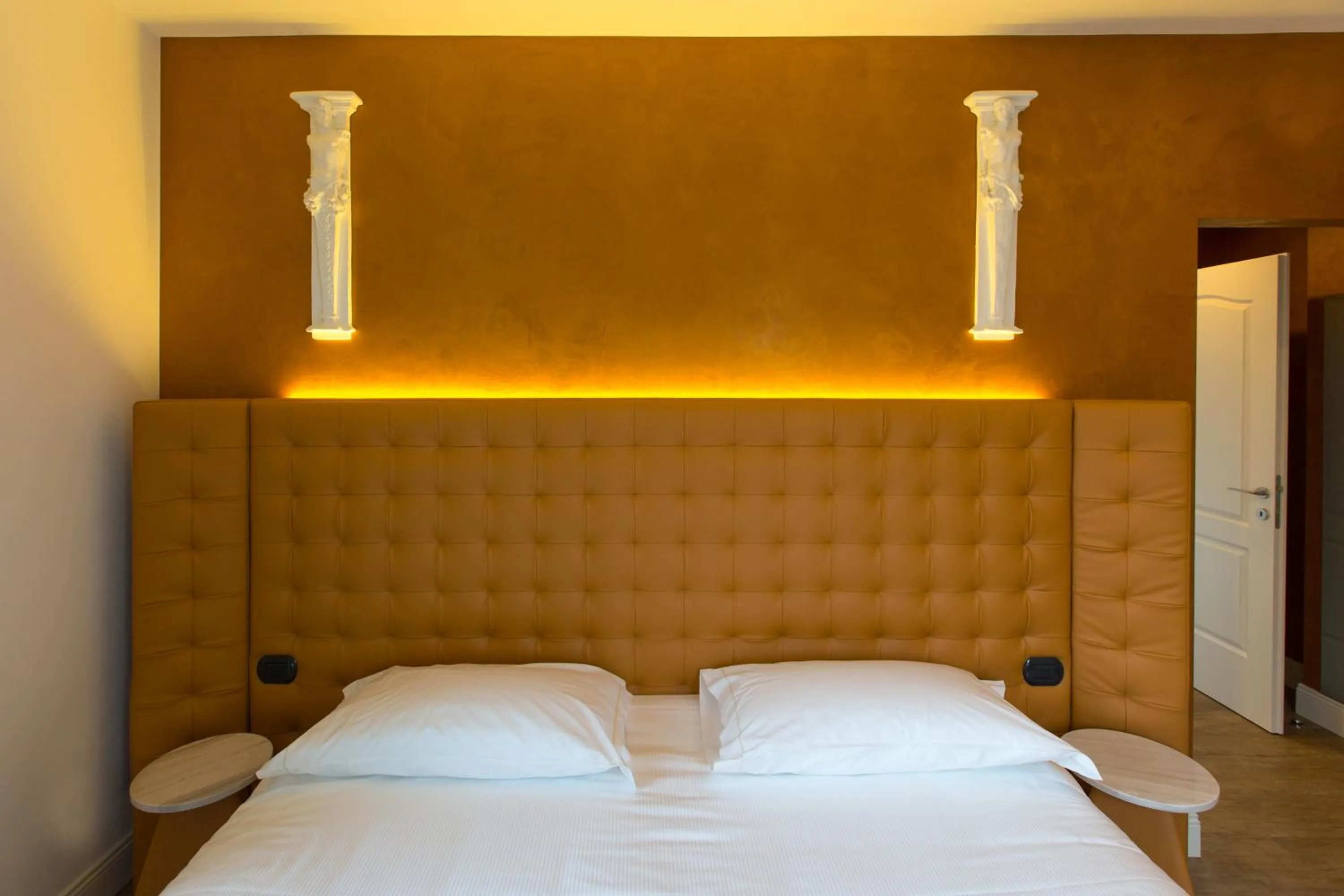 Bedroom, Bed in Hotel Al Campanile - Luxury Suites & Apartments