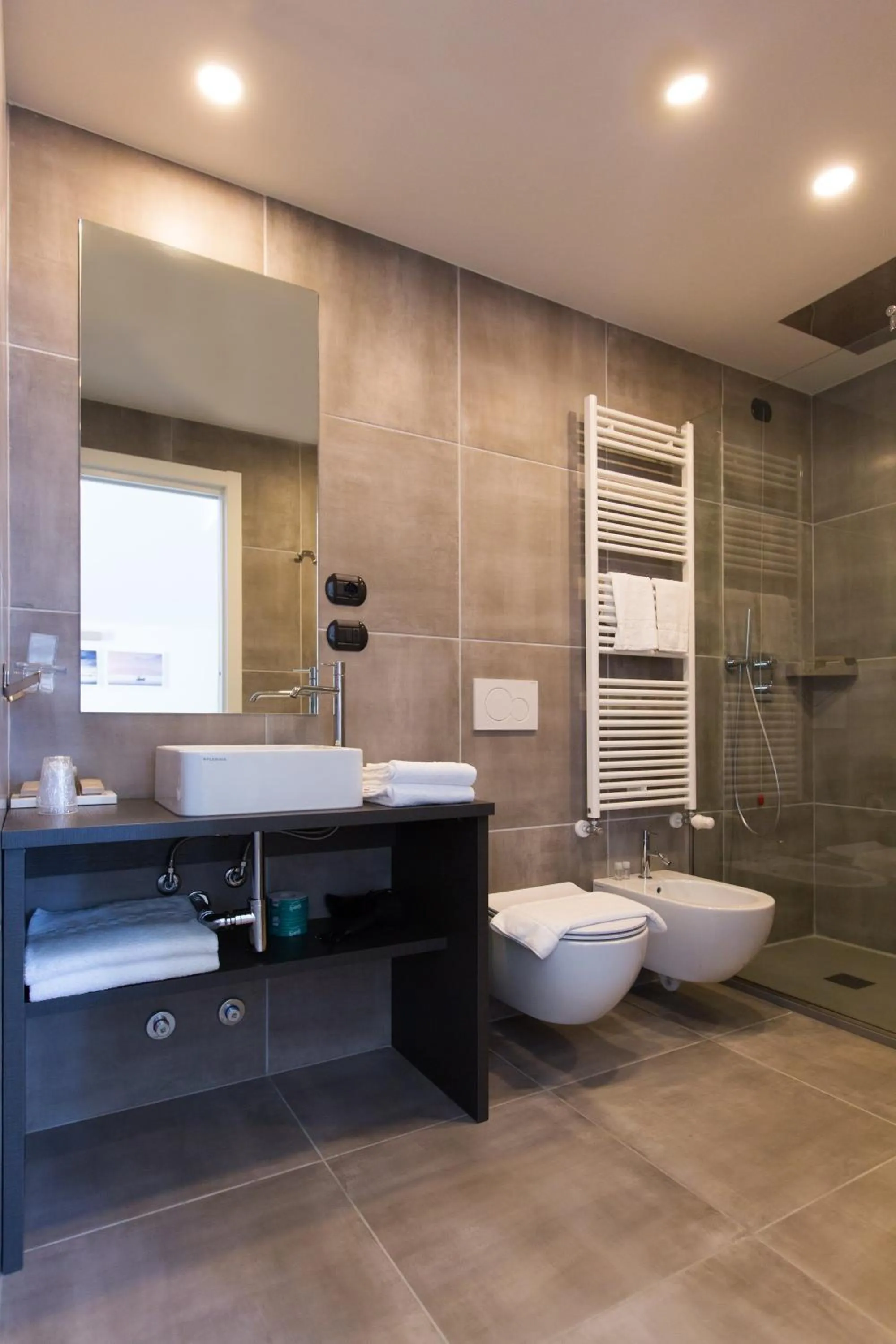 Bathroom in Hotel Al Campanile - Luxury Suites & Apartments