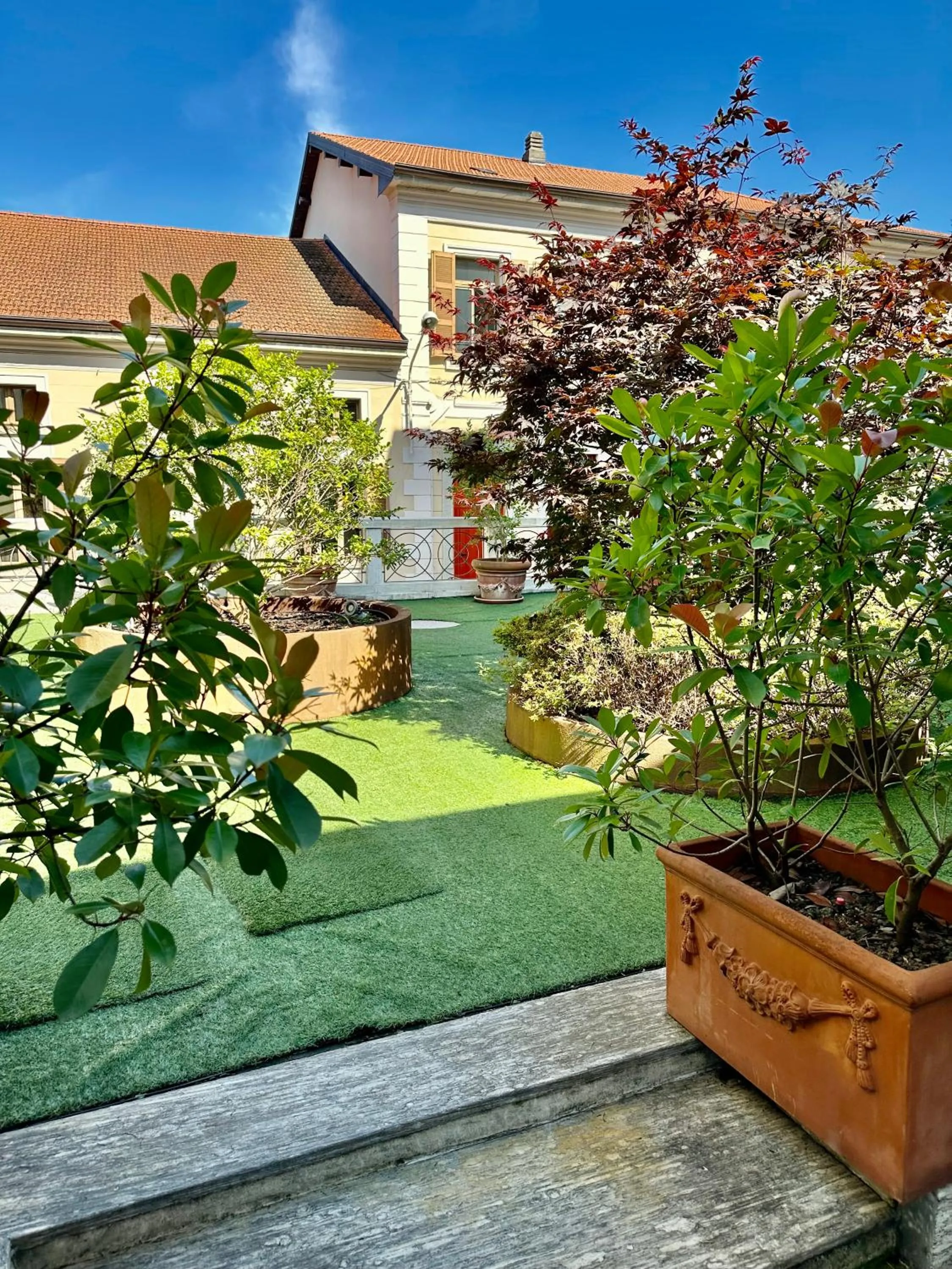 Garden in Hotel Al Campanile - Luxury Suites & Apartments