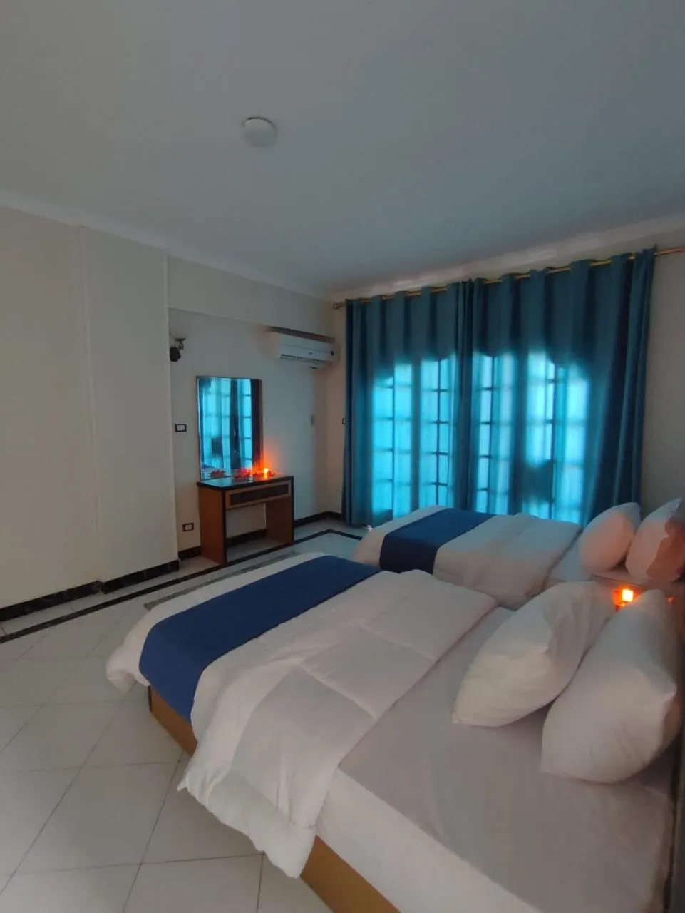 Bed in Ajami Hotel Armed Forces Apartments