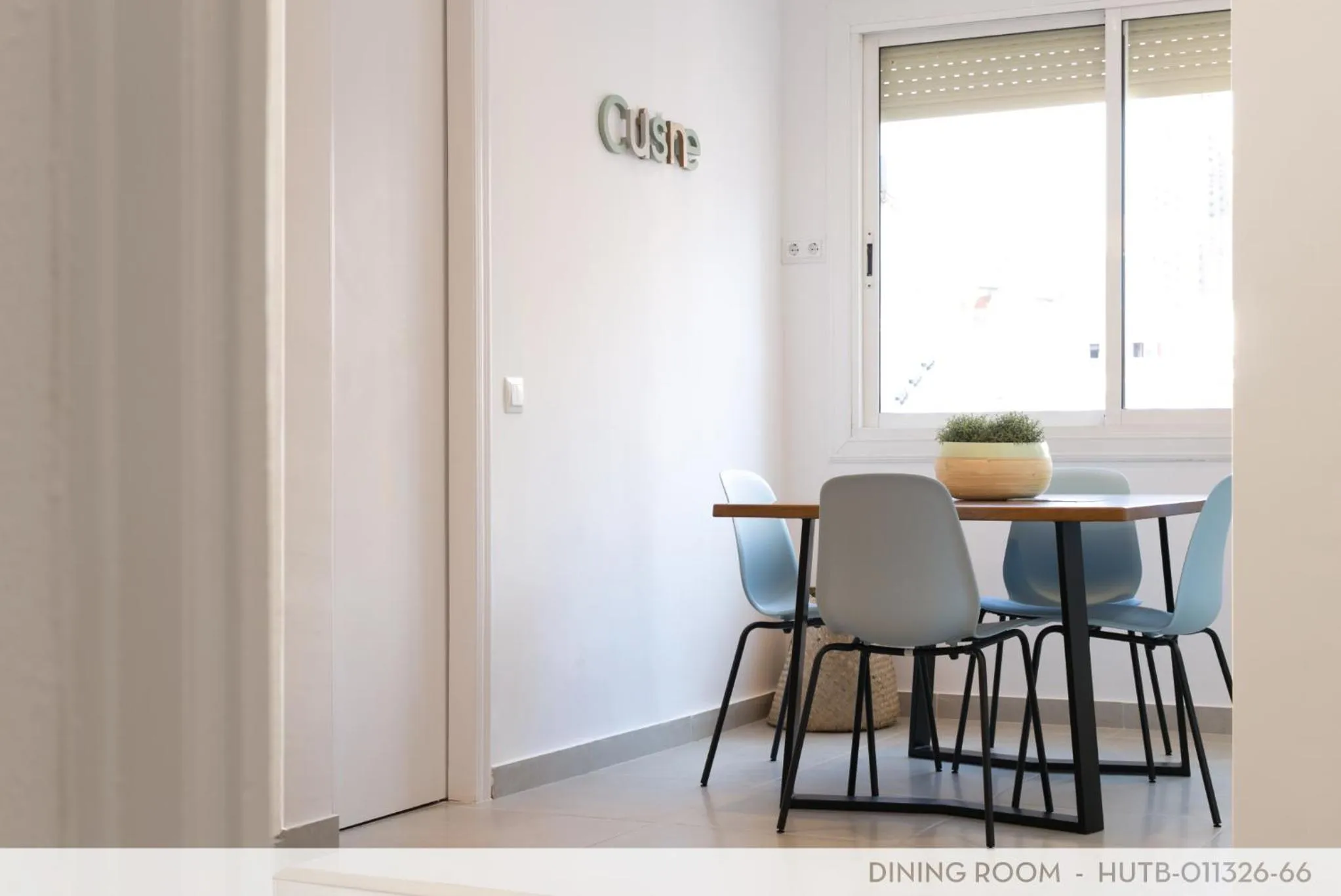 Dining area in Suite Place Barcelona Còrsega