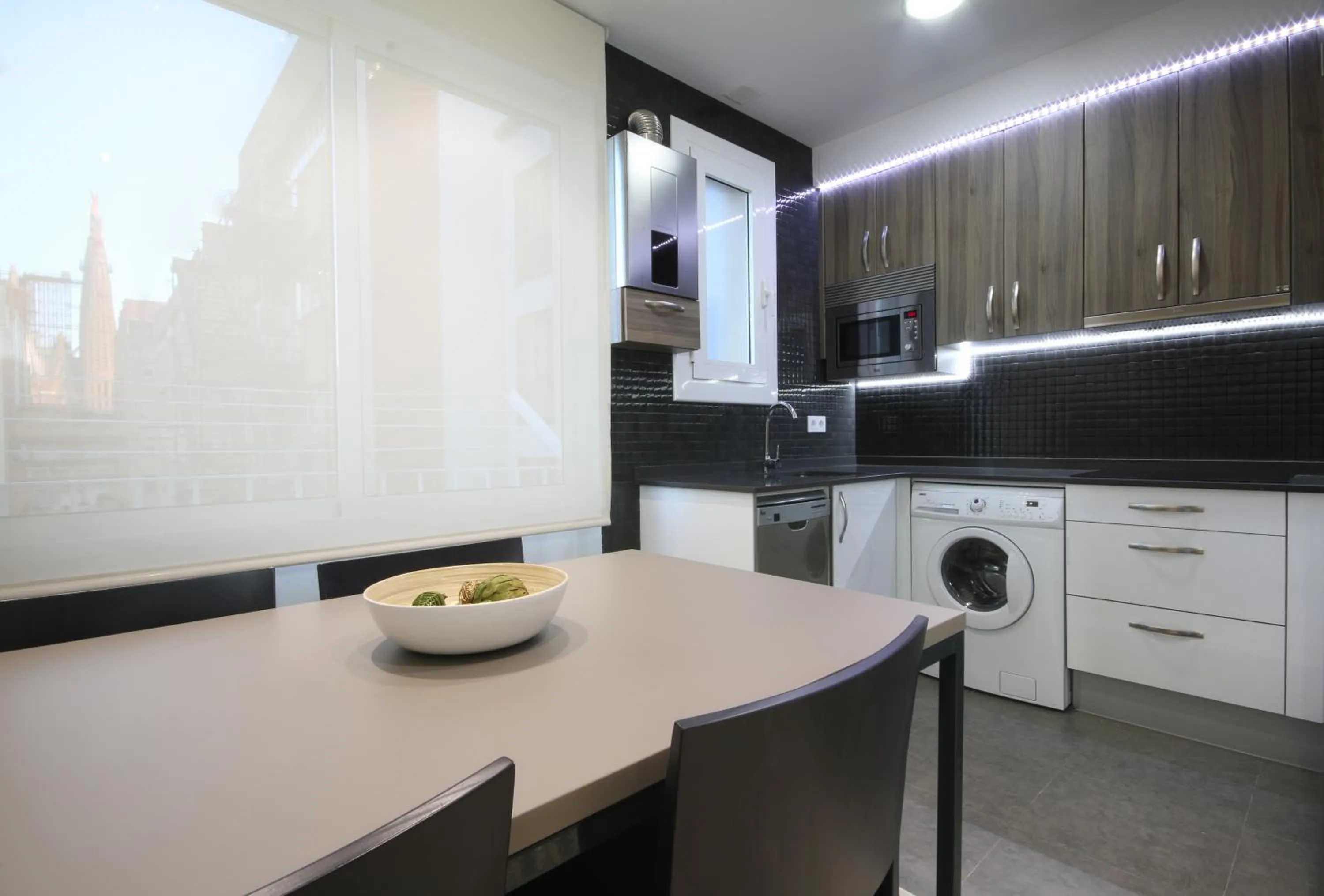 Kitchen or kitchenette in Suite Place Barcelona Còrsega