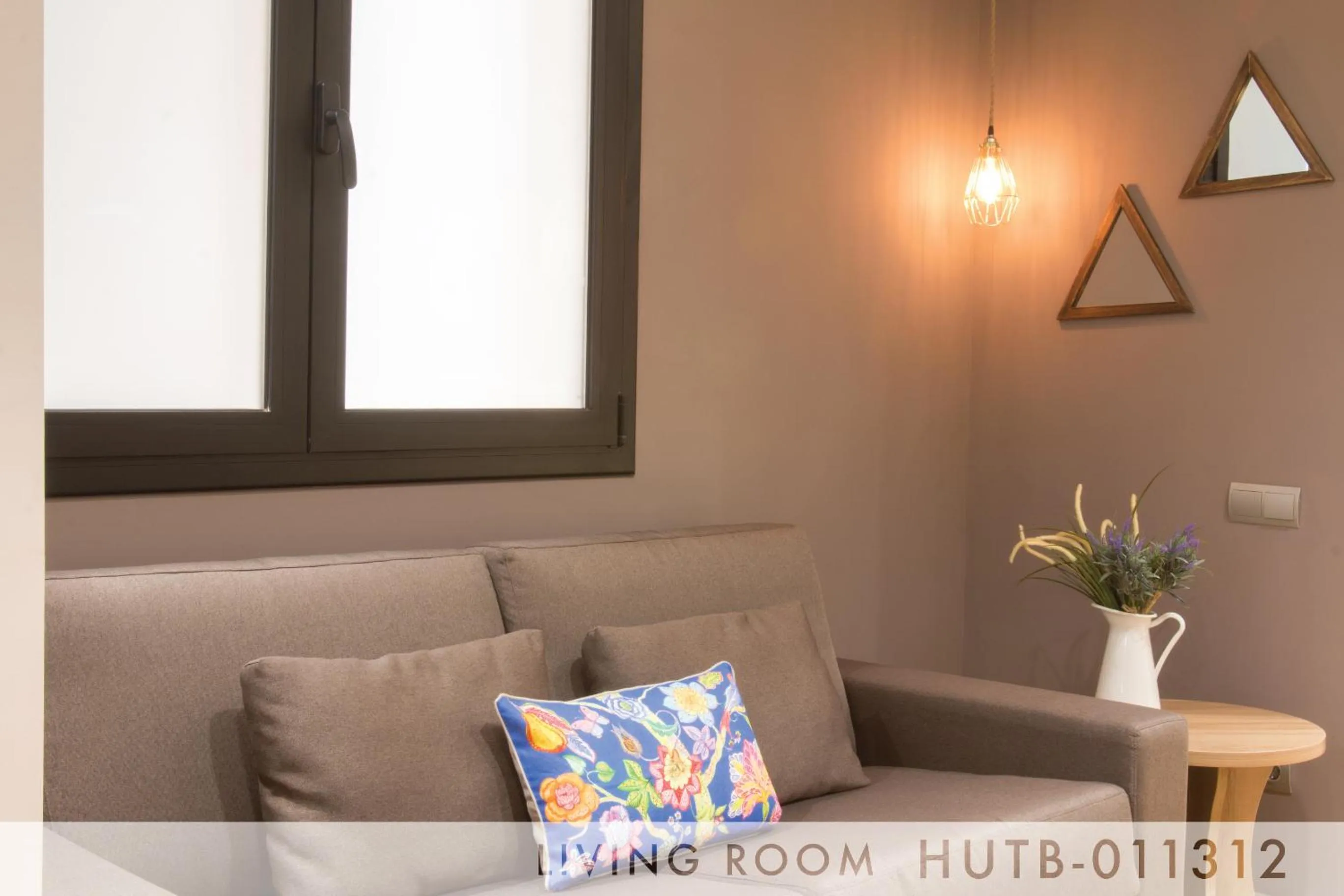 Living room in Suite Place Barcelona Còrsega