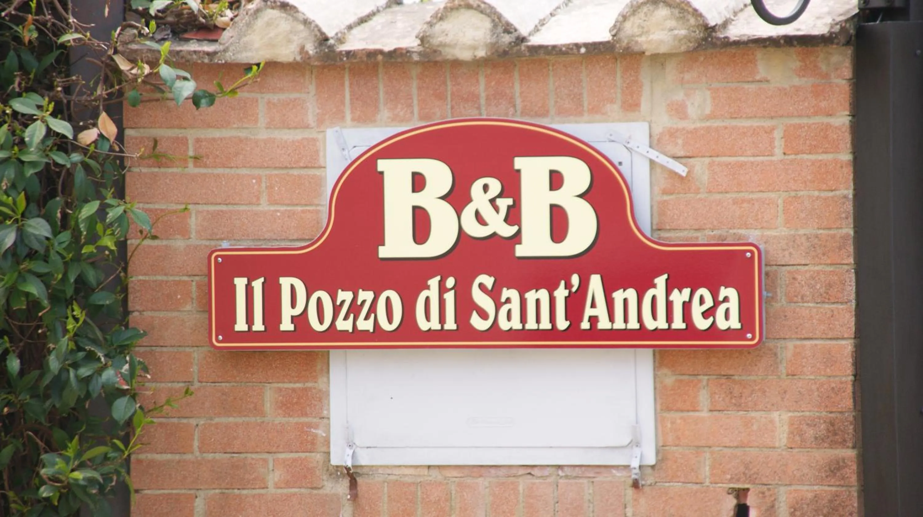 Property logo or sign in Il Pozzo Di Sant'Andrea