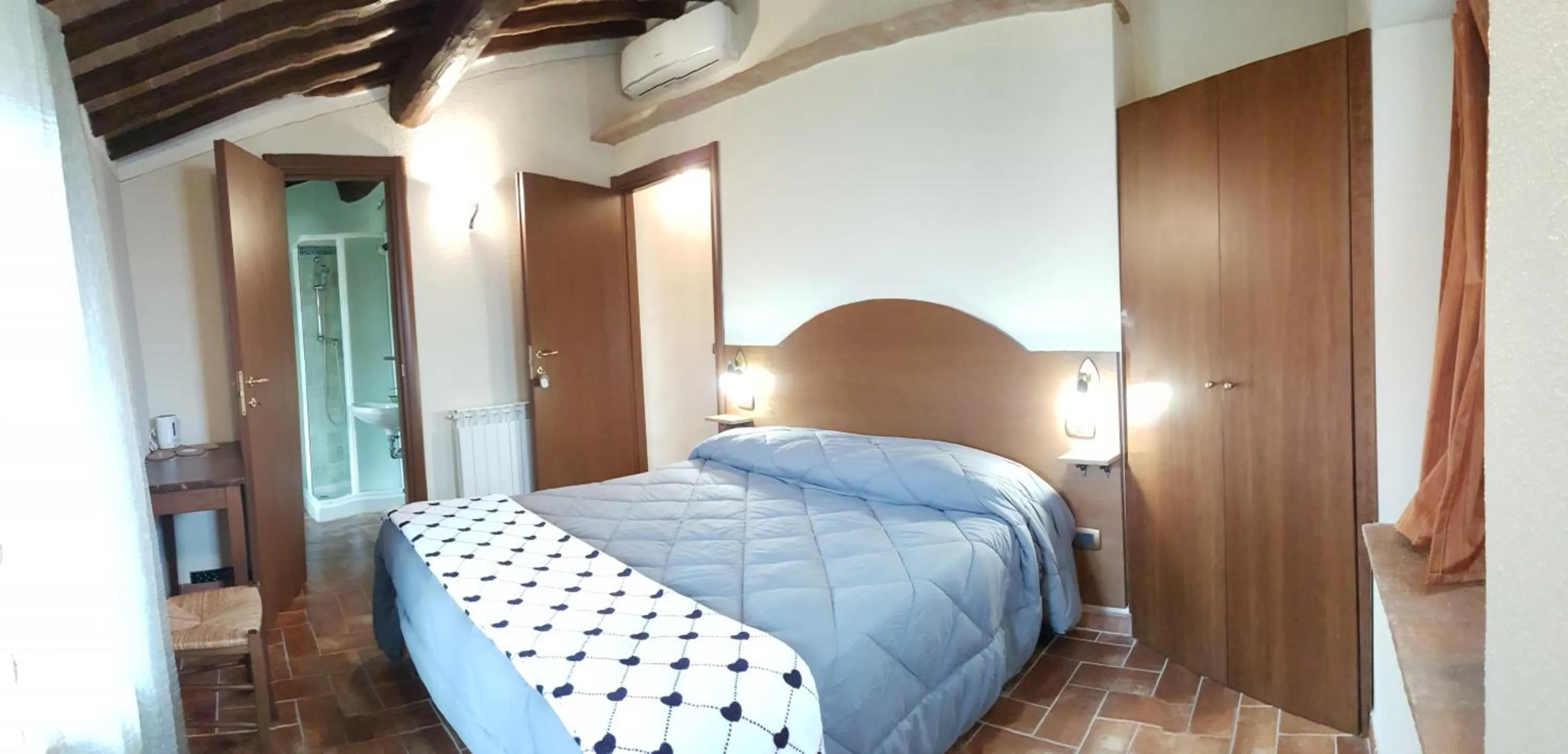 Photo of the whole room, Bed in Il Pozzo Di Sant'Andrea