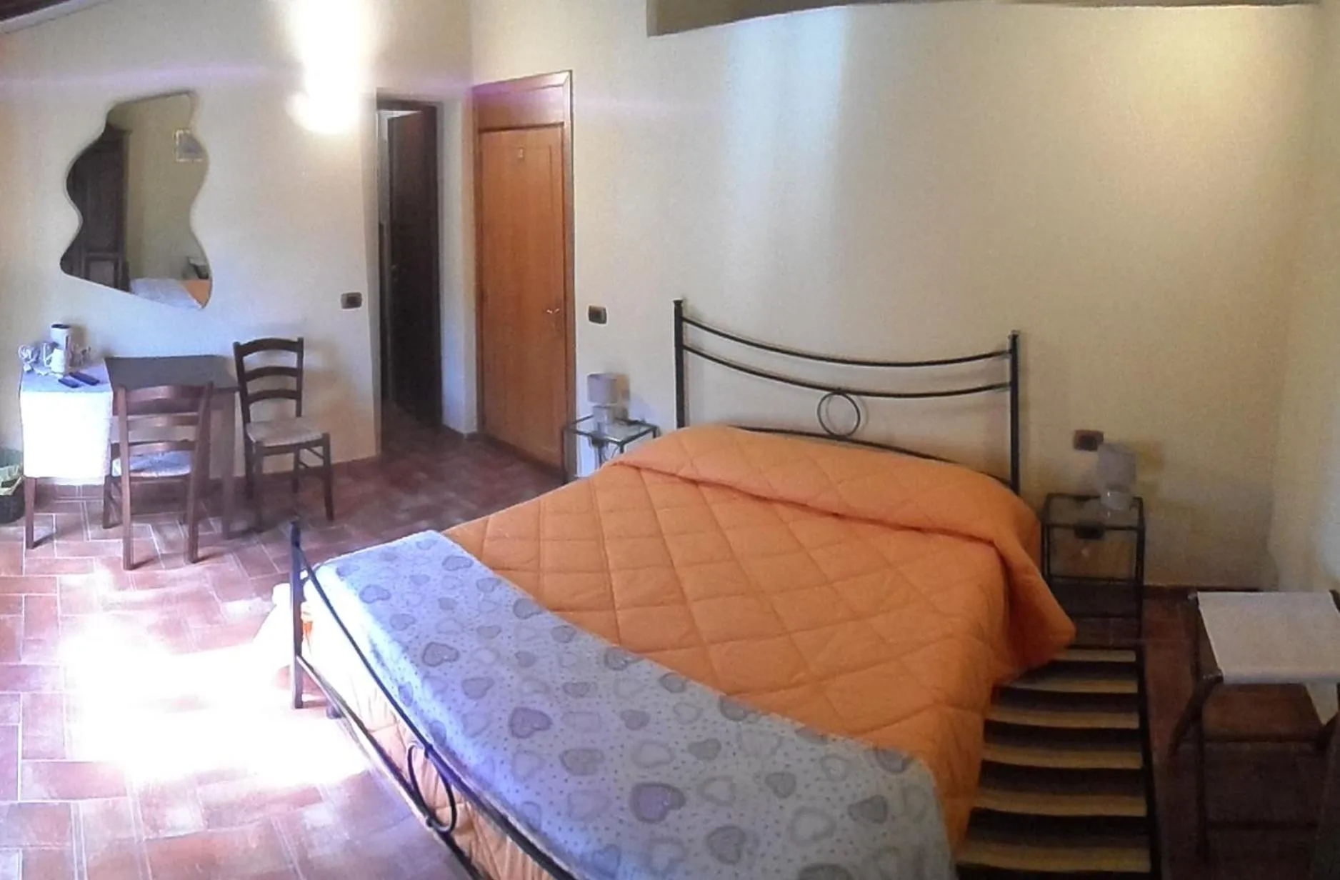Photo of the whole room, Bed in Il Pozzo Di Sant'Andrea