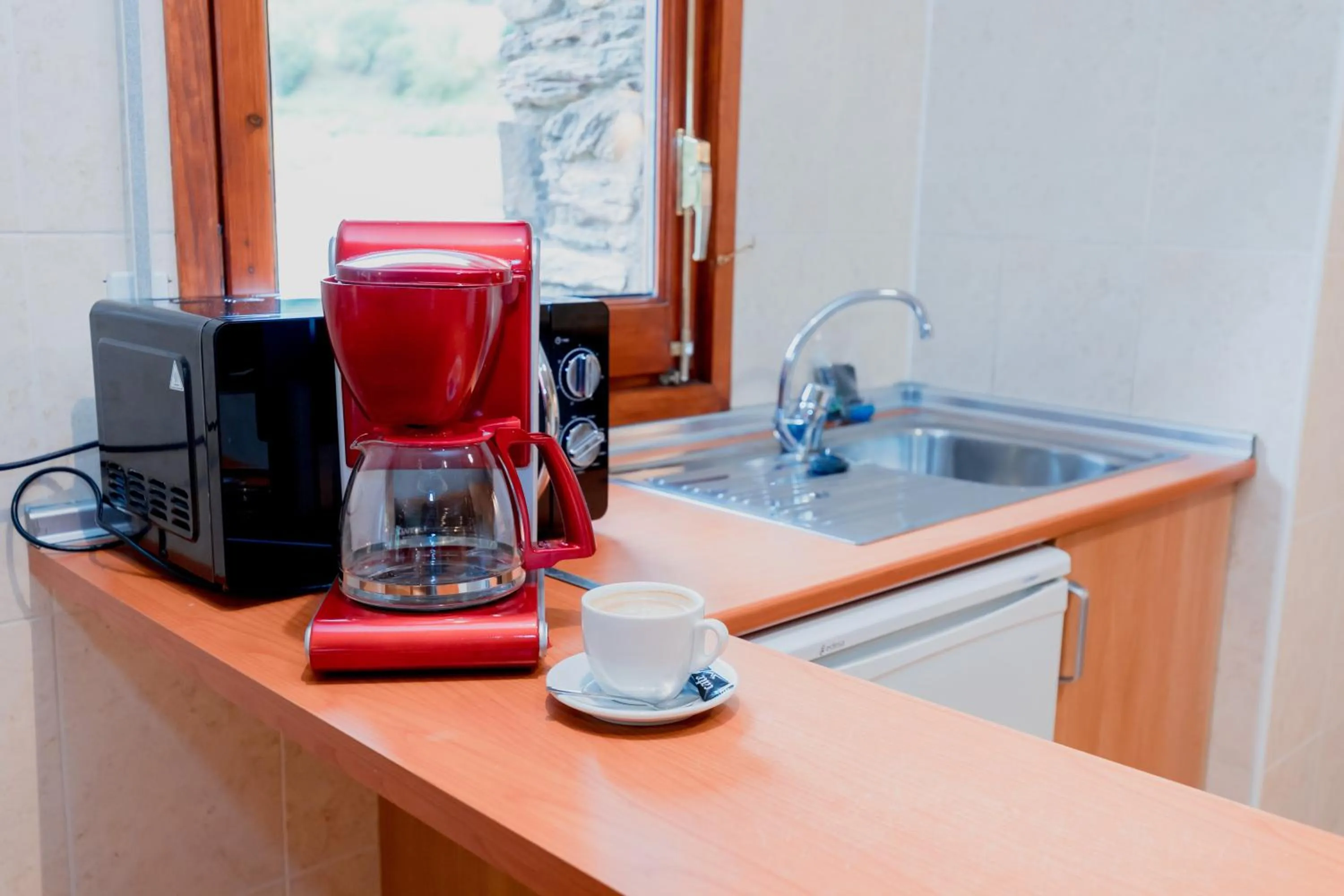 Kitchen or kitchenette in Pierre & Vacances Aparthotel La Tulipa