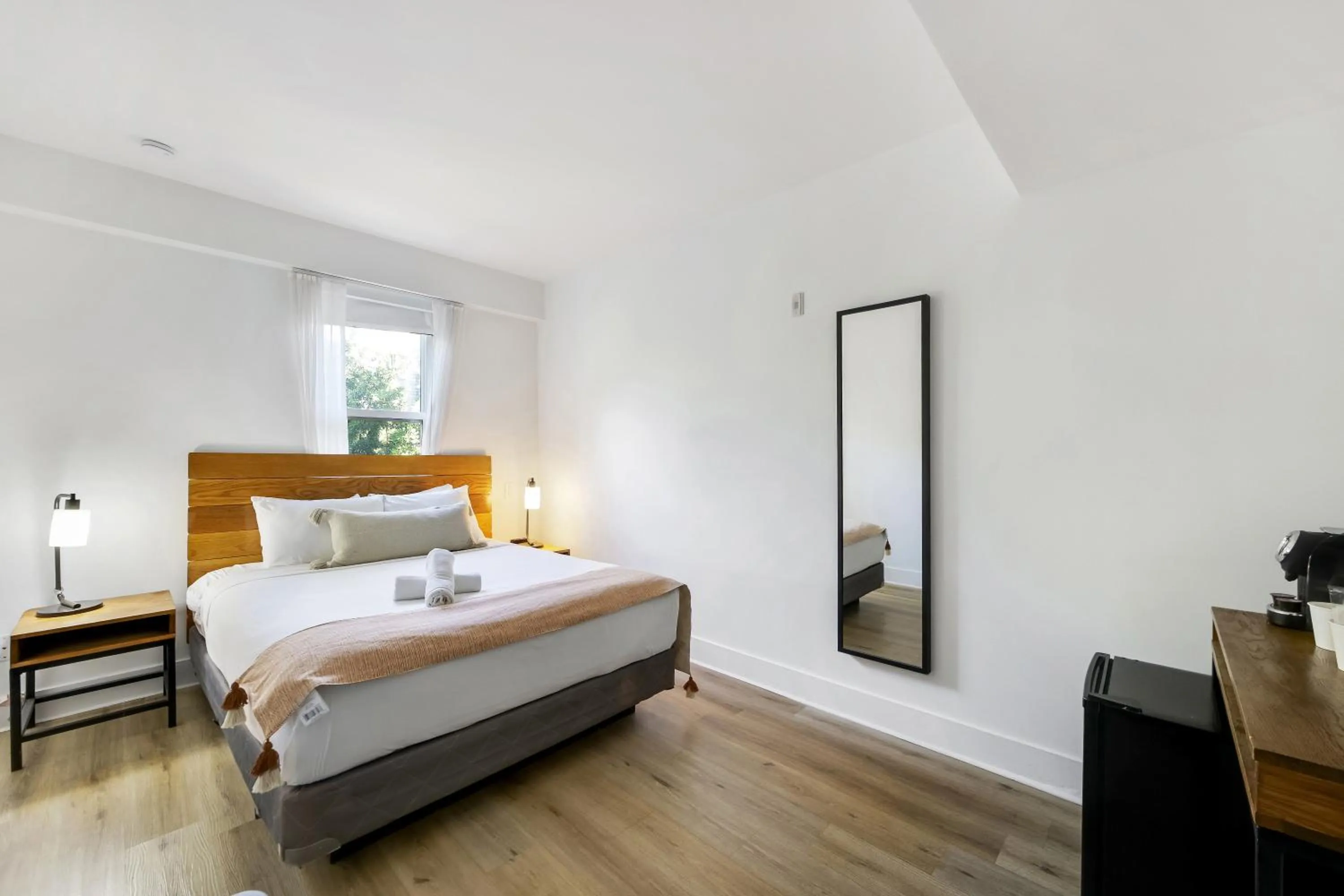 Bed in The Meridian Hotel by At Mine Hospitality