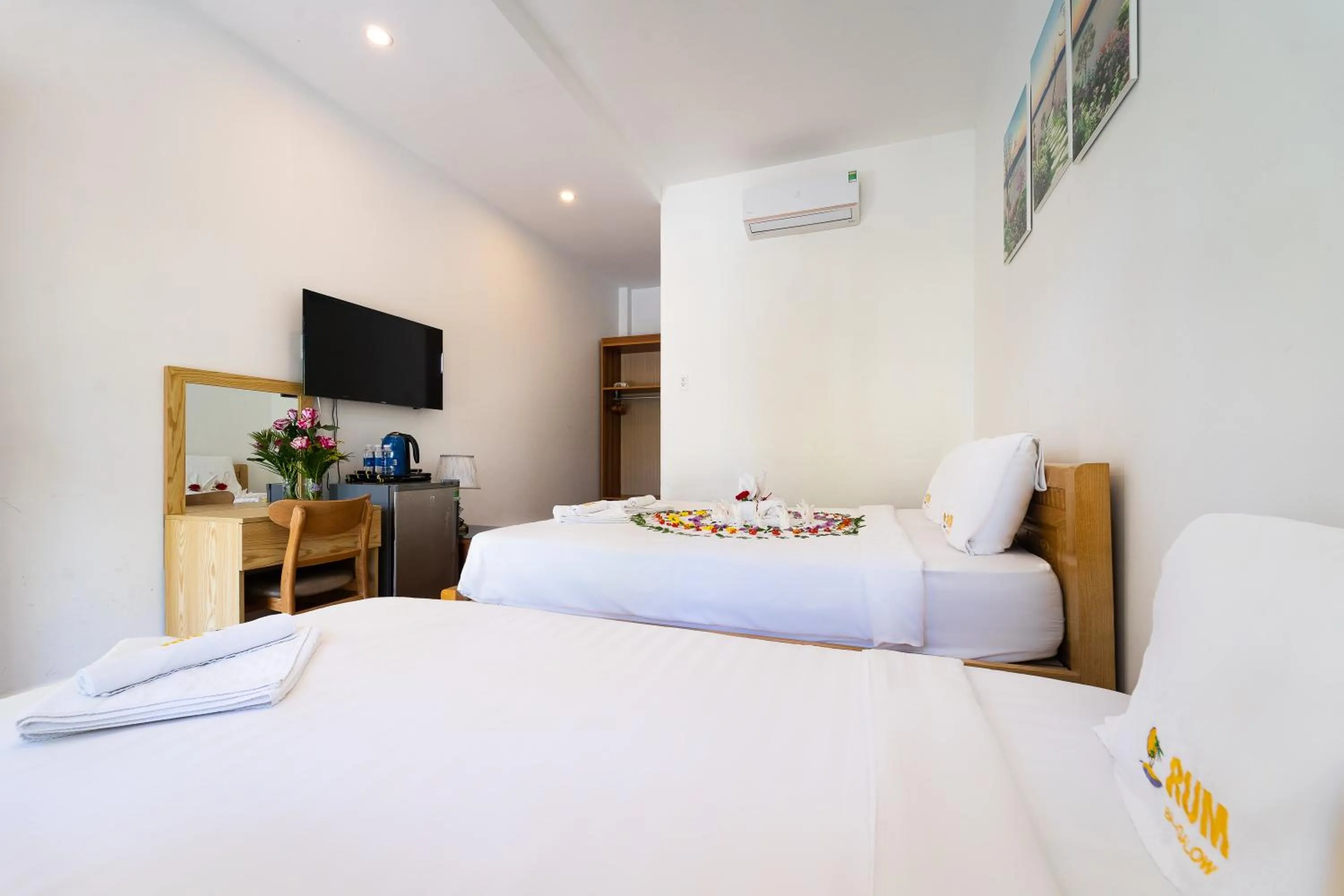 Communal lounge/ TV room, Bed in Rum Resort Phu Quoc