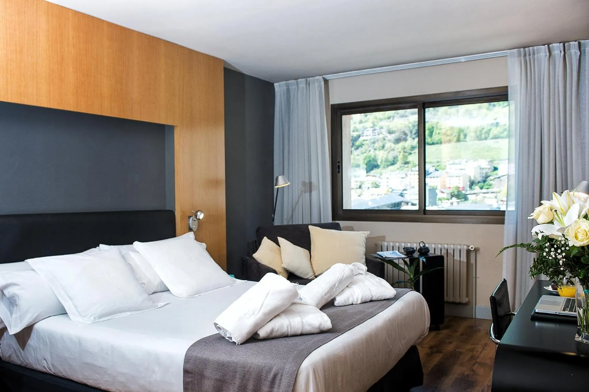 Photo of the whole room, Bed in Roc Blanc Hotel & Spa