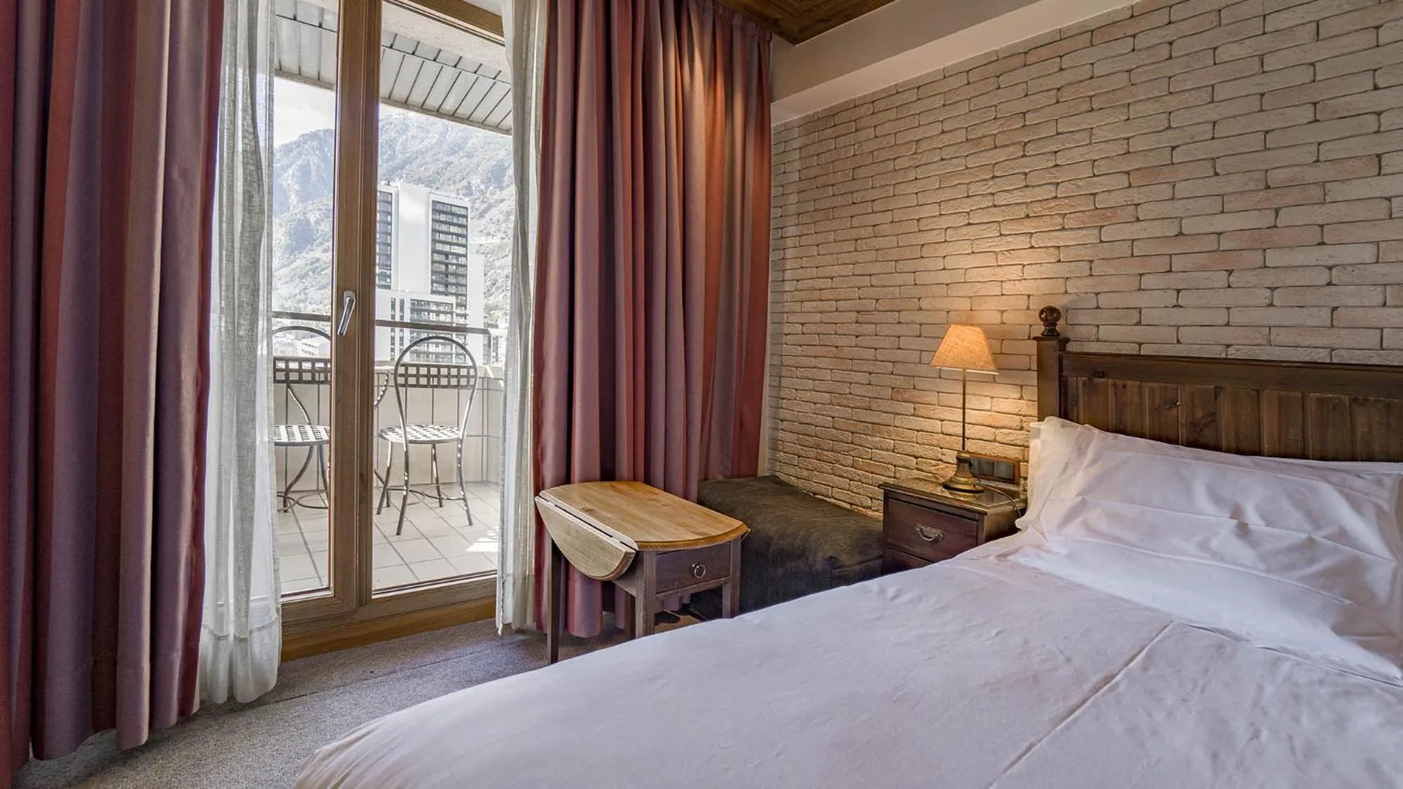 Photo of the whole room, Bed in Roc Blanc Hotel & Spa