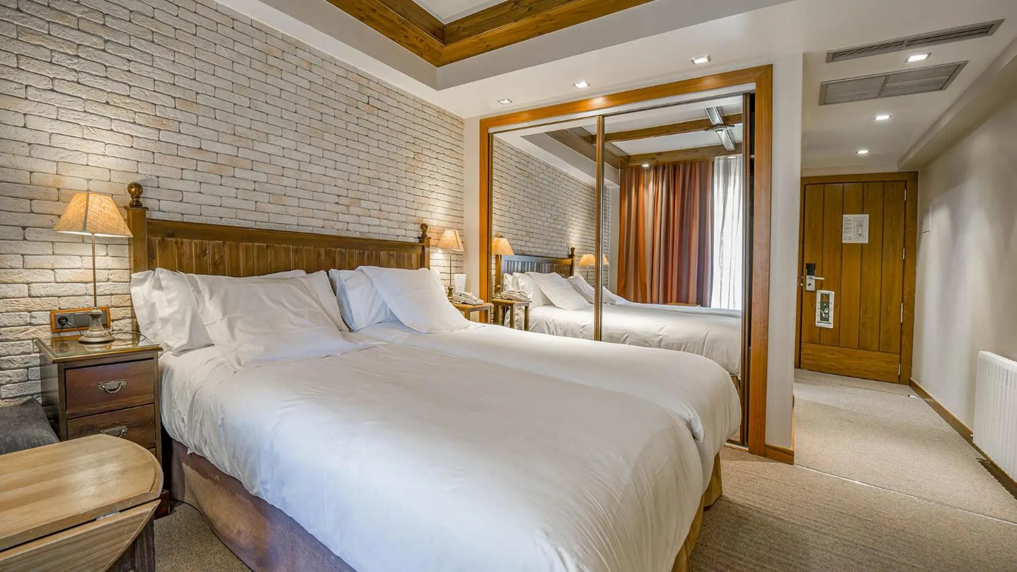 Photo of the whole room, Bed in Roc Blanc Hotel & Spa