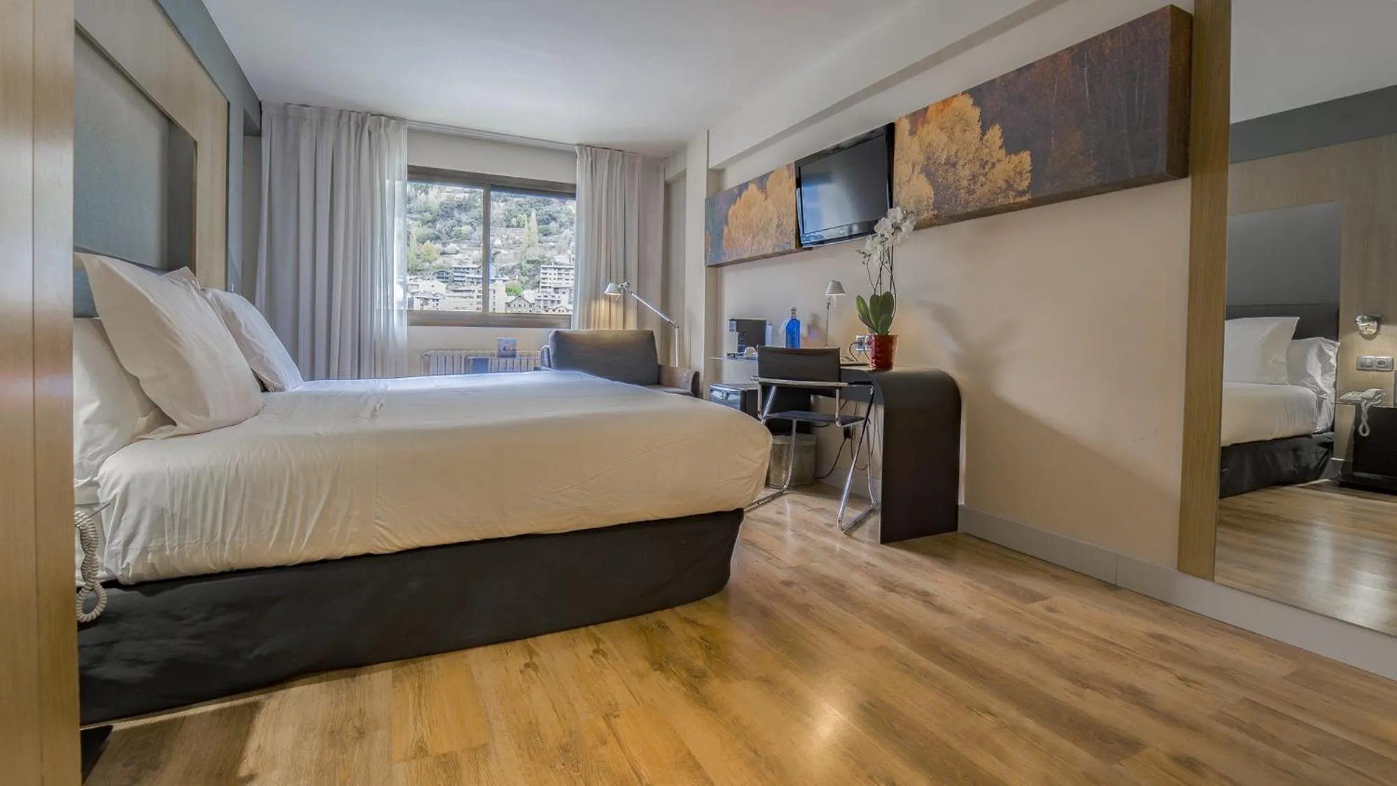 Photo of the whole room, Bed in Roc Blanc Hotel & Spa