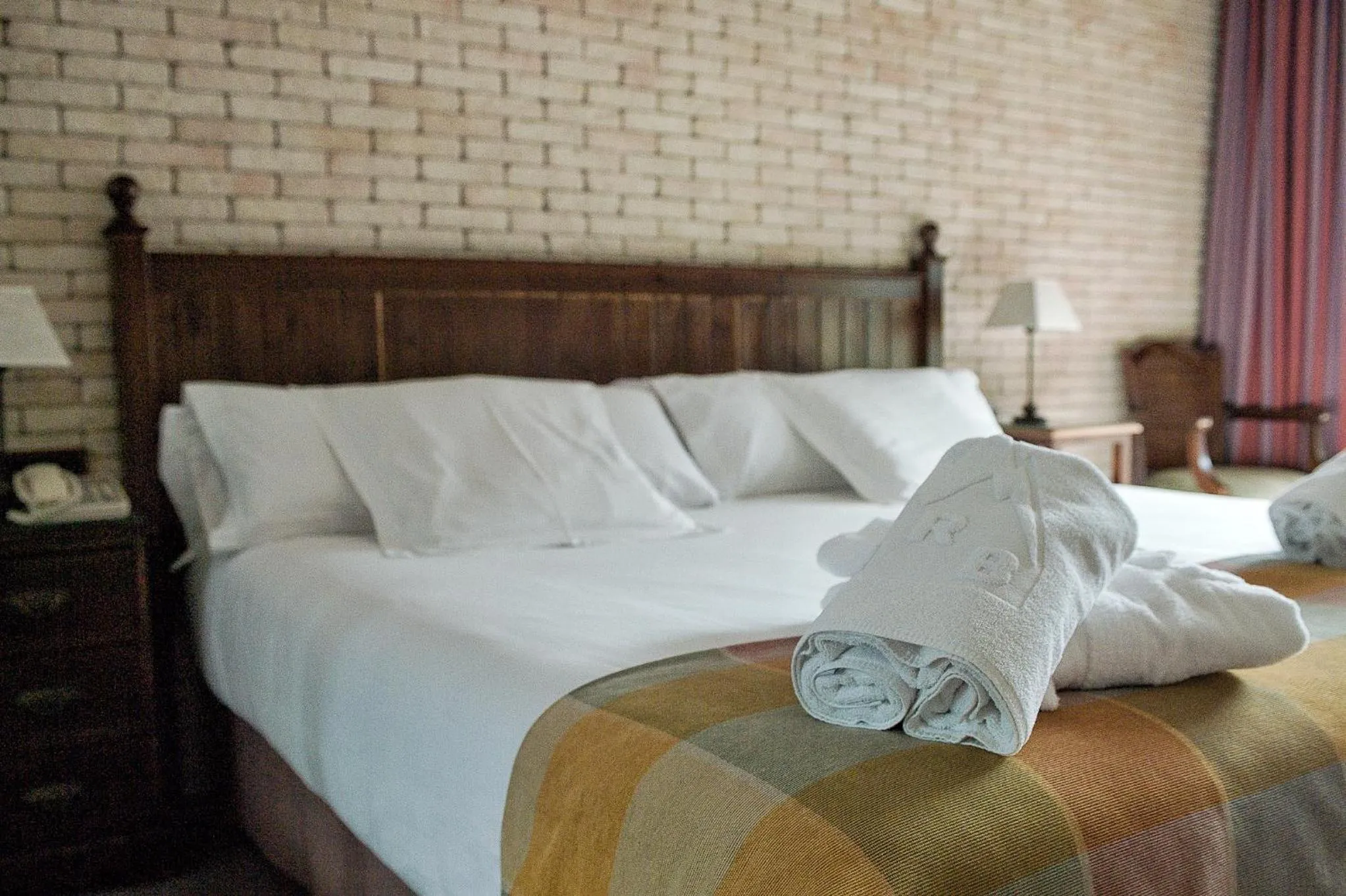 Photo of the whole room, Bed in Roc Blanc Hotel & Spa