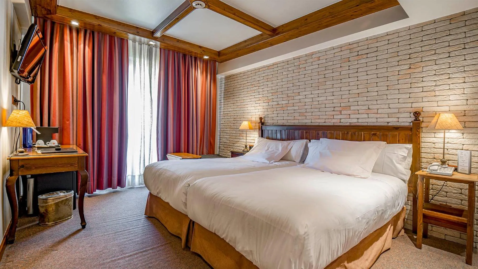 Photo of the whole room, Bed in Roc Blanc Hotel & Spa