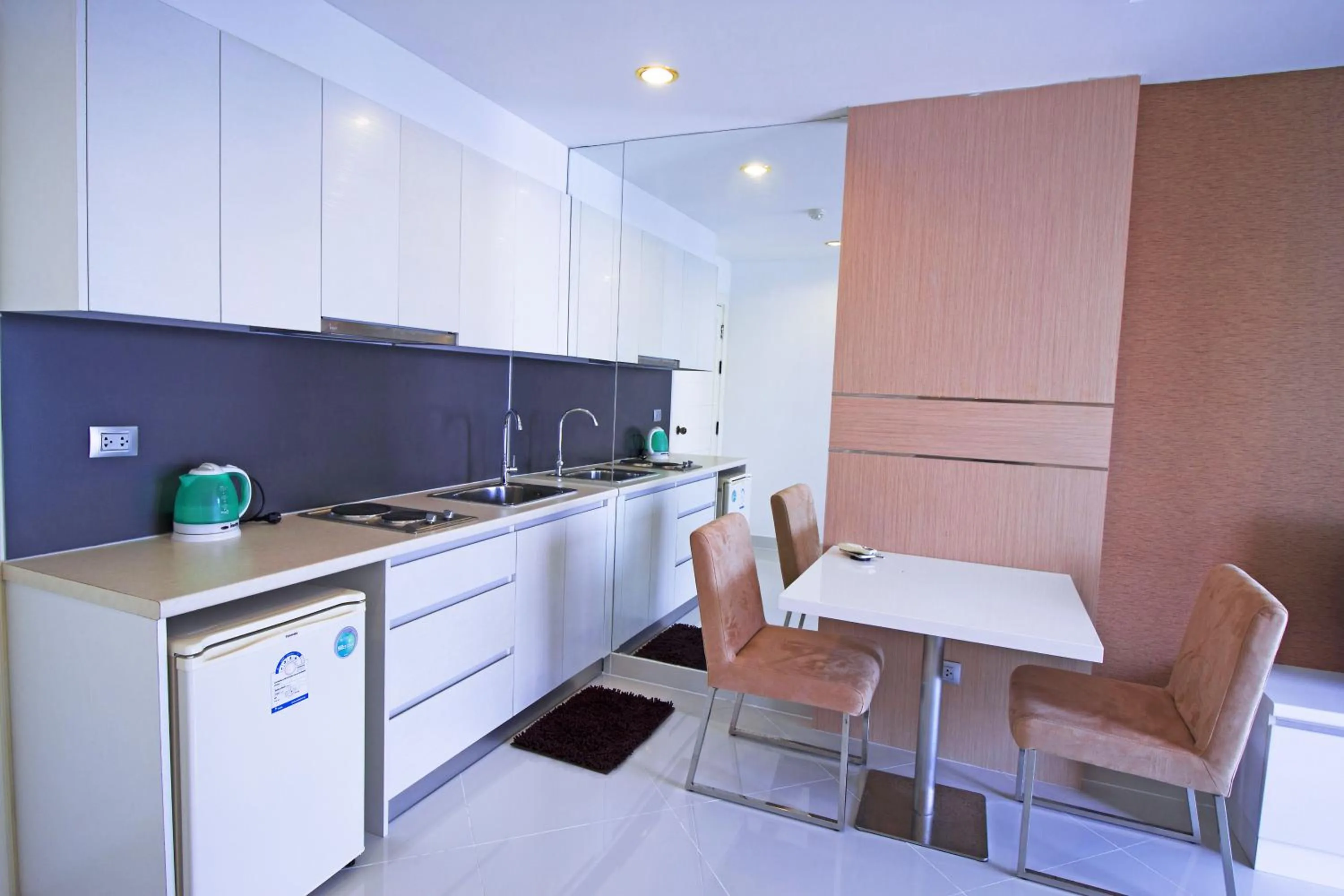 Kitchen or kitchenette in Paradise Park Jomtien by Pattaya Sunny Rentals