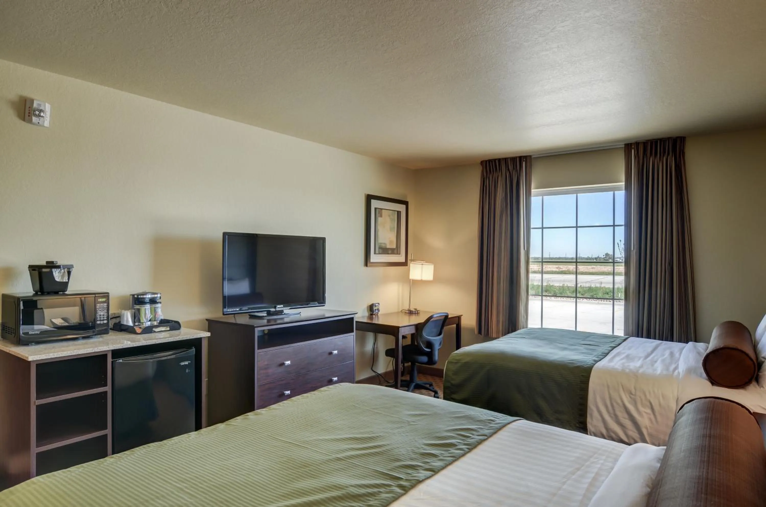 Bed in Cobblestone Inn & Suites - Ord