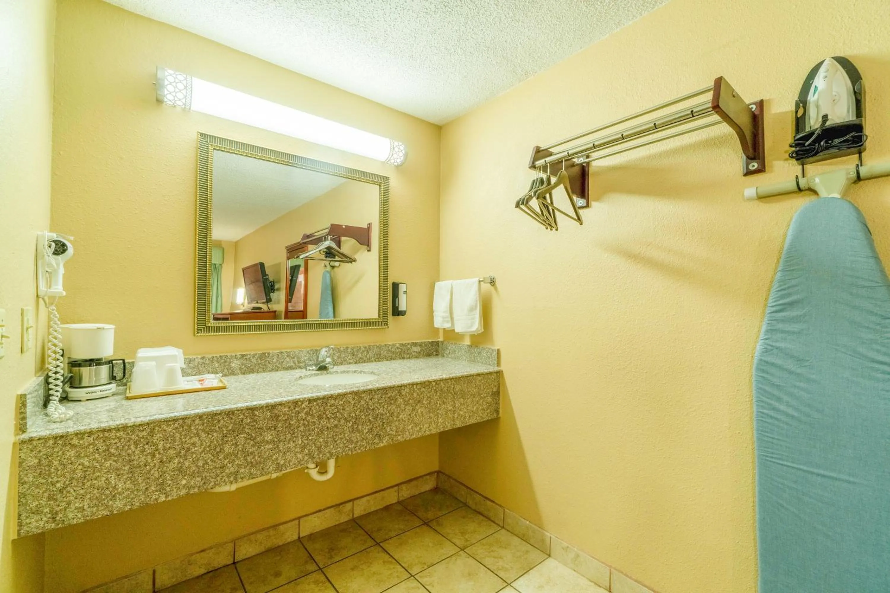 Bathroom in Crown Inn By OYO Denver Tx