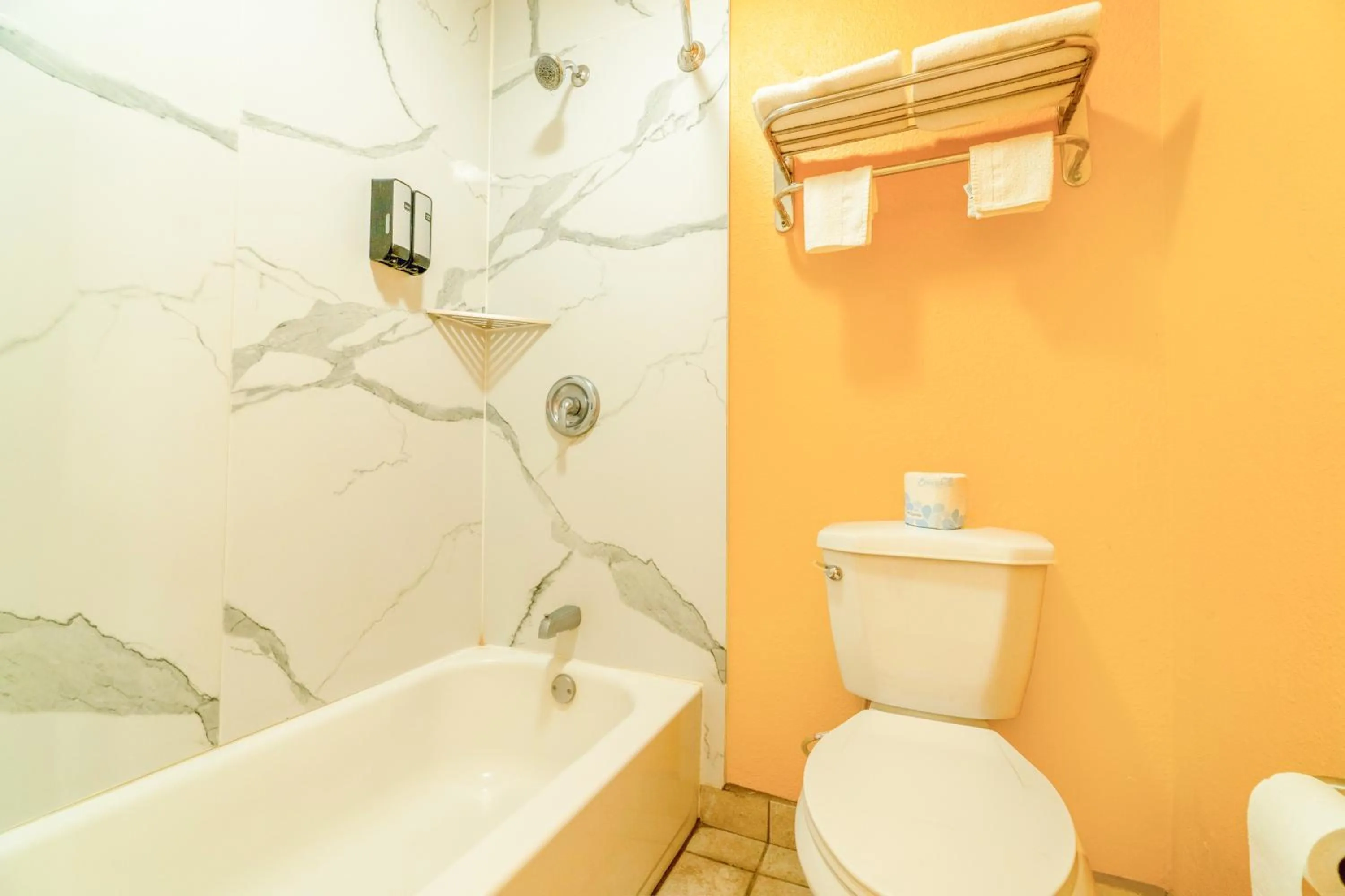 Bathroom in Crown Inn By OYO Denver Tx