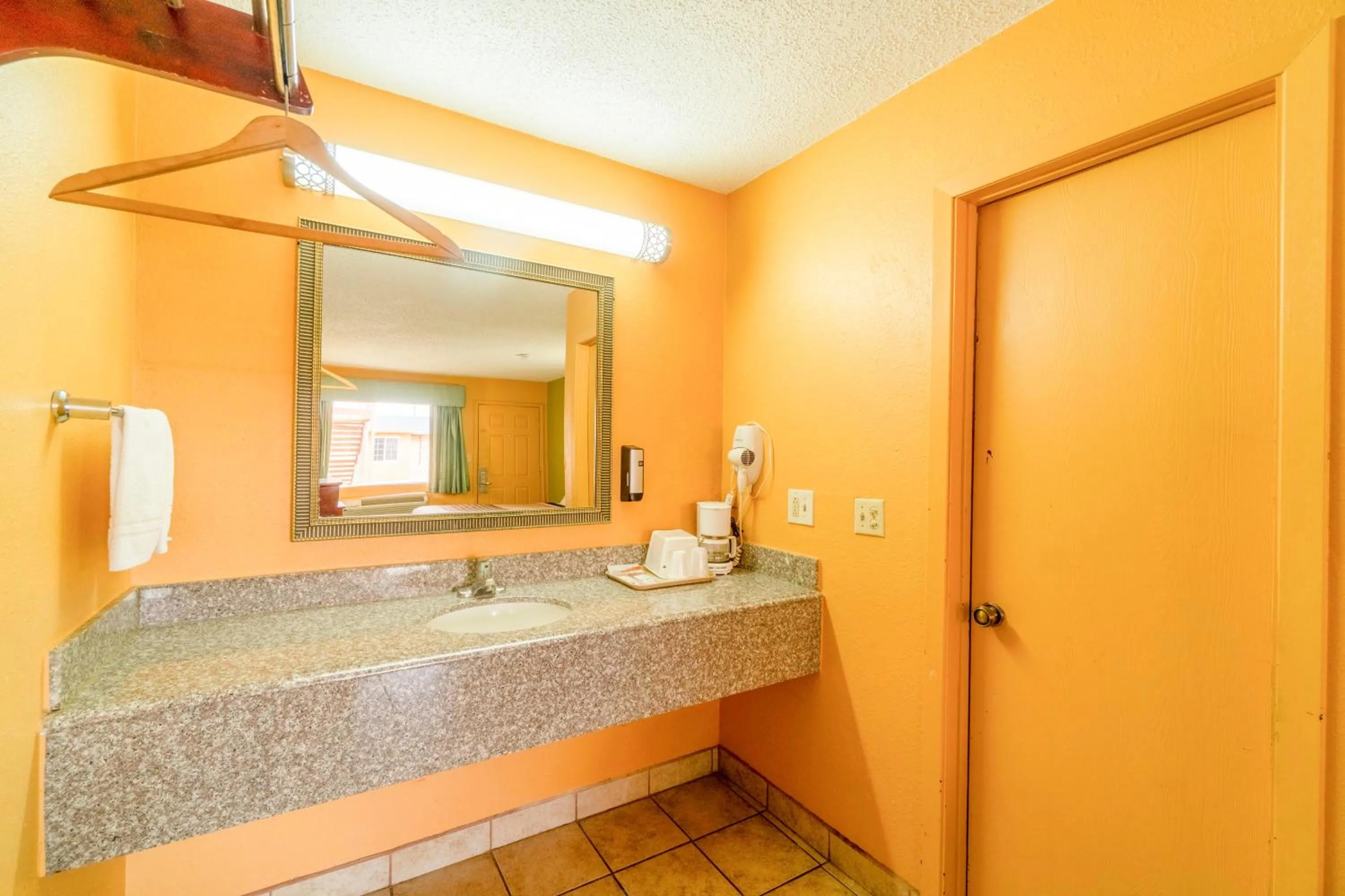 Bathroom in Crown Inn By OYO Denver Tx