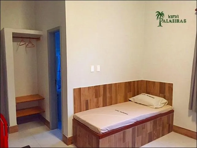 Seating area, Bed in Hotel Palmeiras Ltda