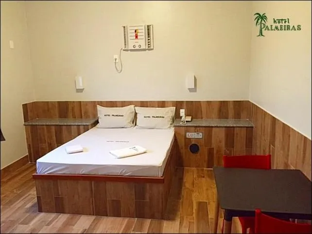 Photo of the whole room, Bed in Hotel Palmeiras Ltda