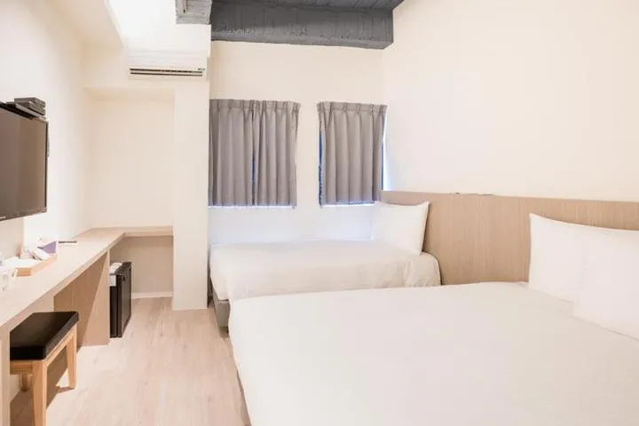 Bed in Traveller-Inn Day Moon Hotel