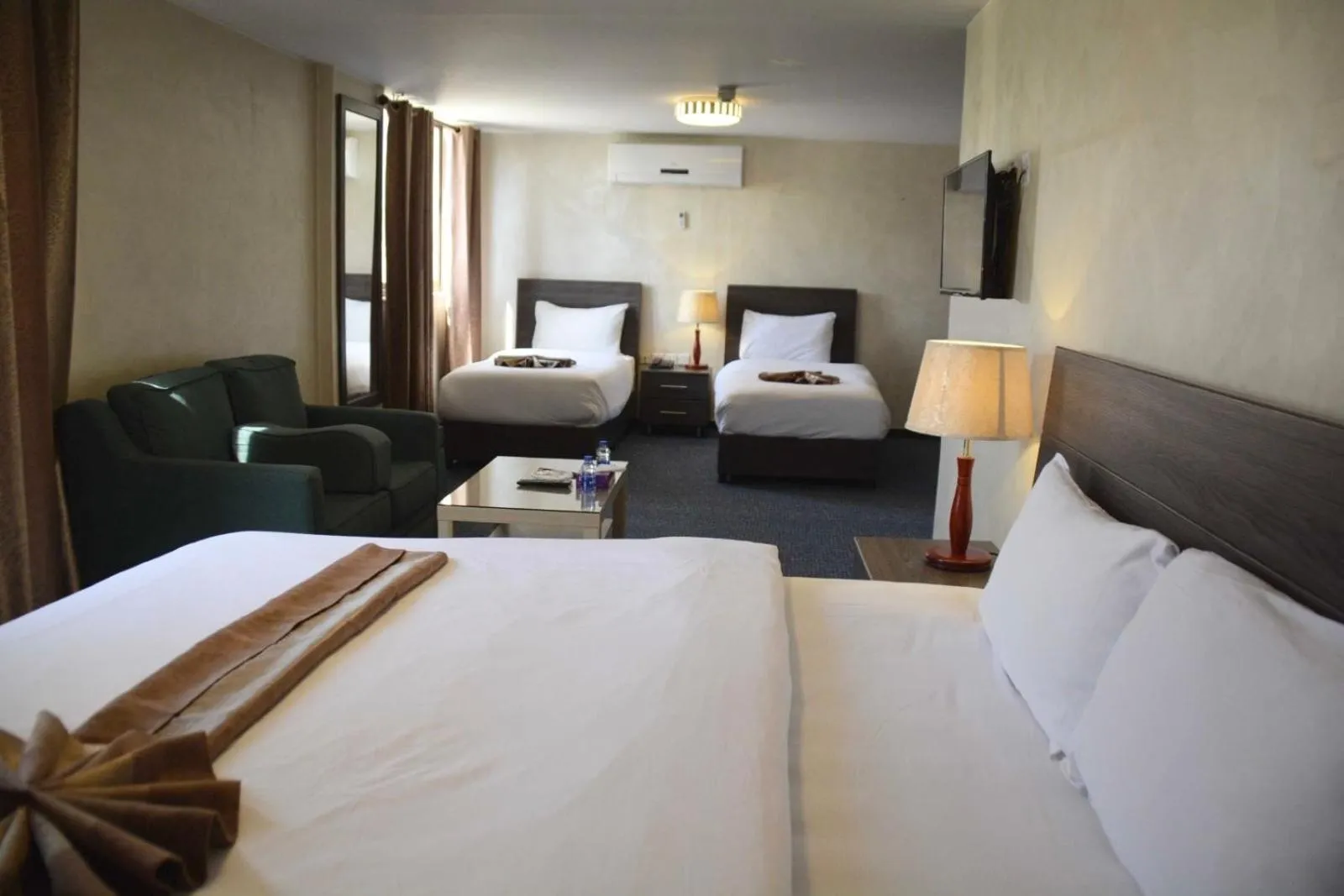 Bed in Olive Hotel Amman