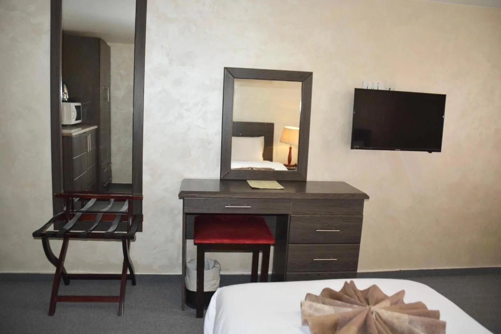 Bed in Olive Hotel Amman