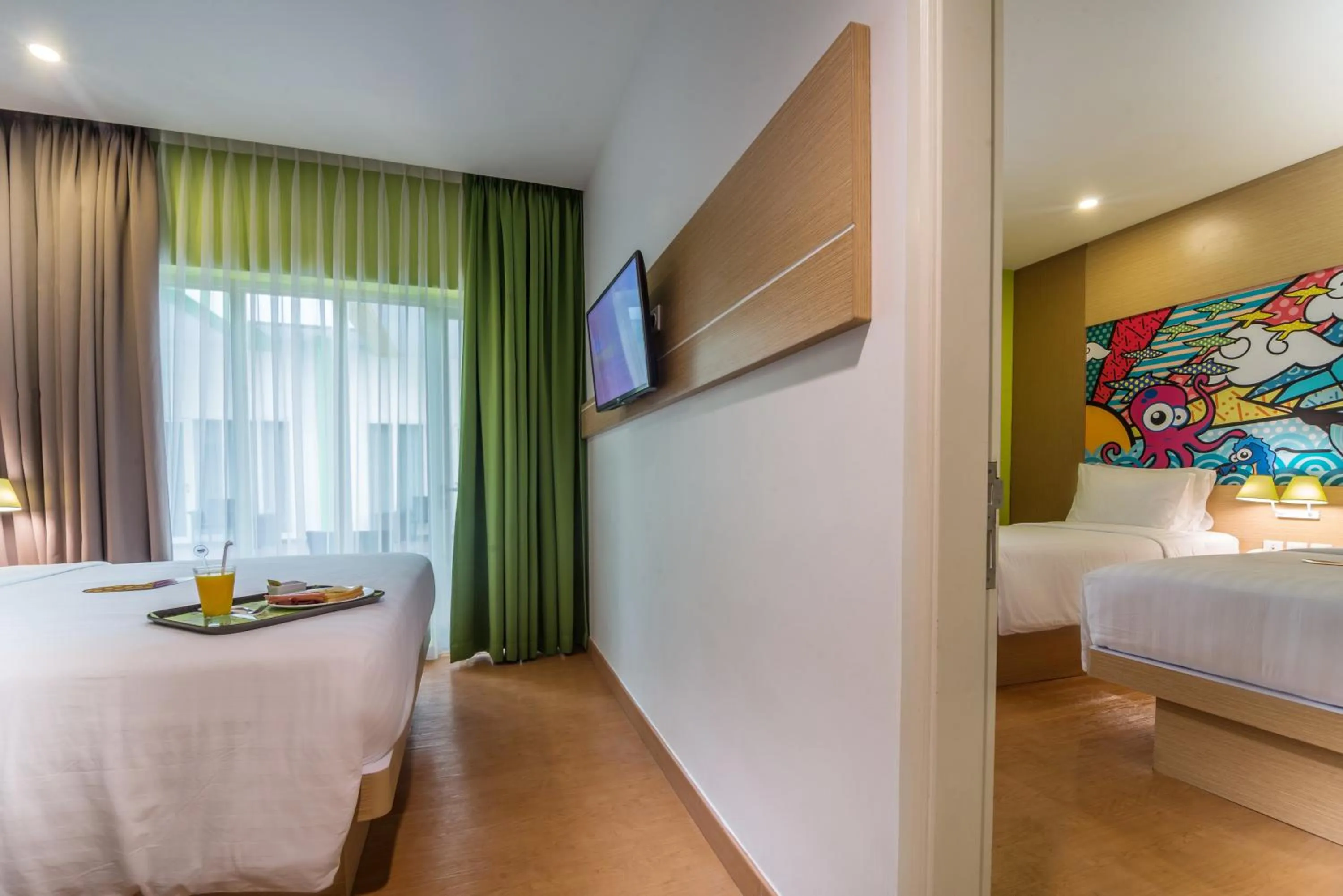 Bed in MaxOneHotels at Resort Makassar