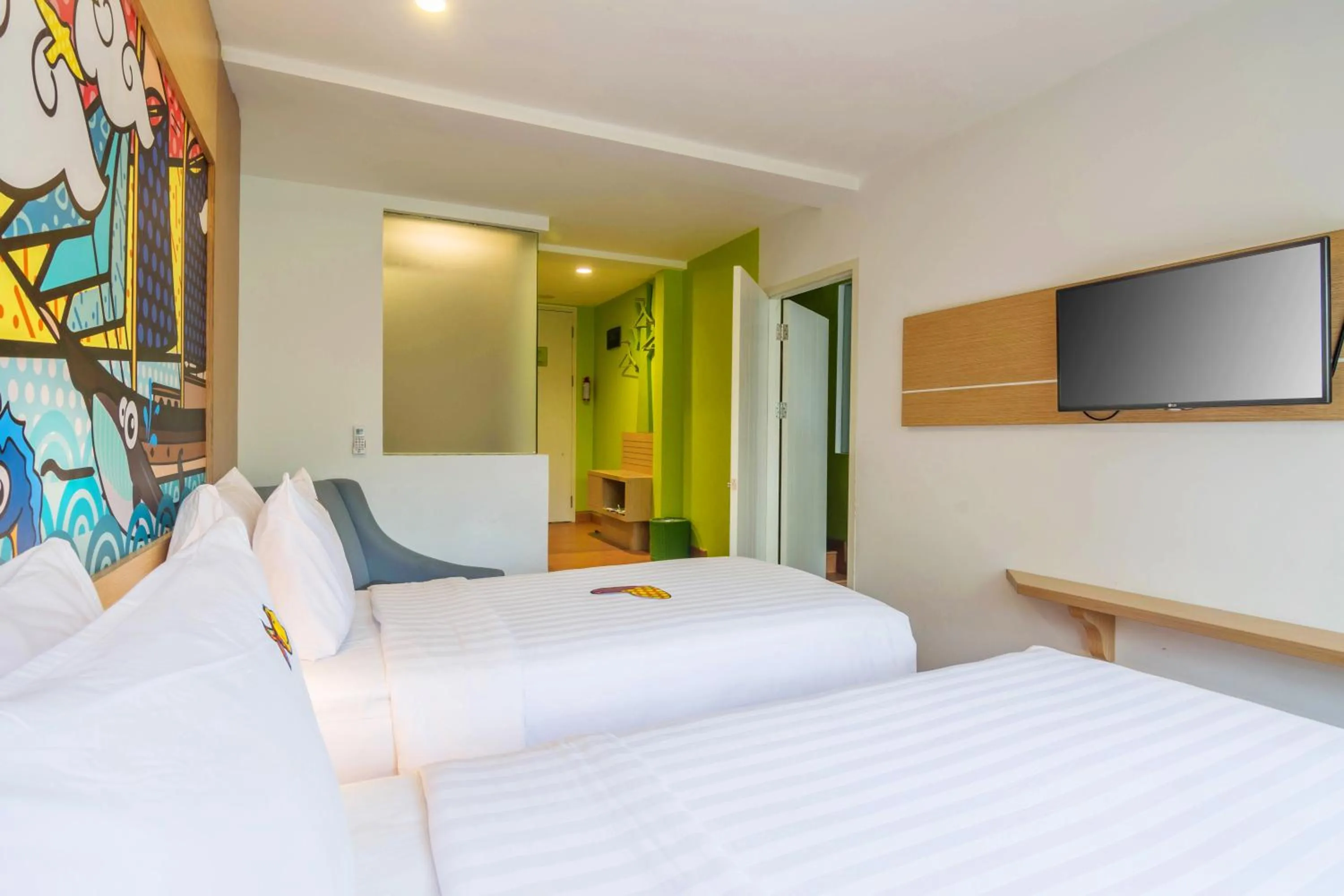Bedroom, Bed in MaxOneHotels at Resort Makassar