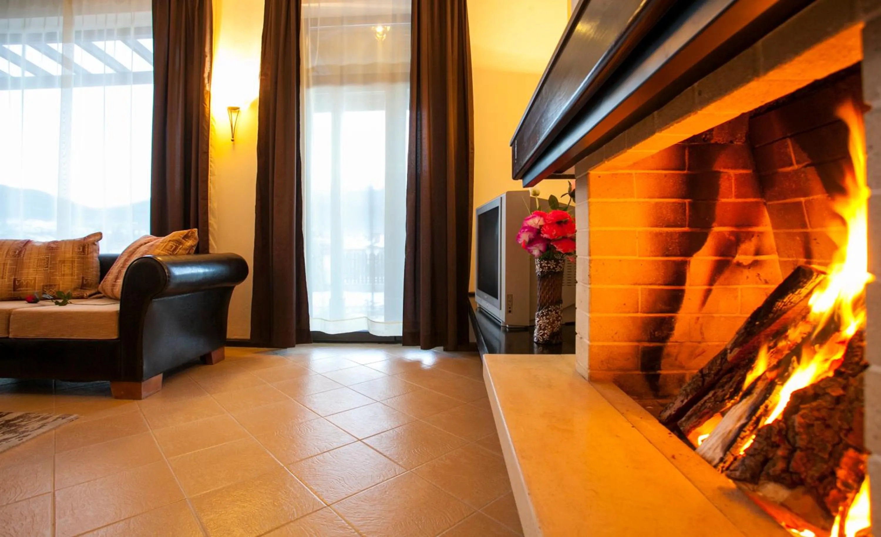 Communal lounge/ TV room in Holiday Village COOP Dobrinishte