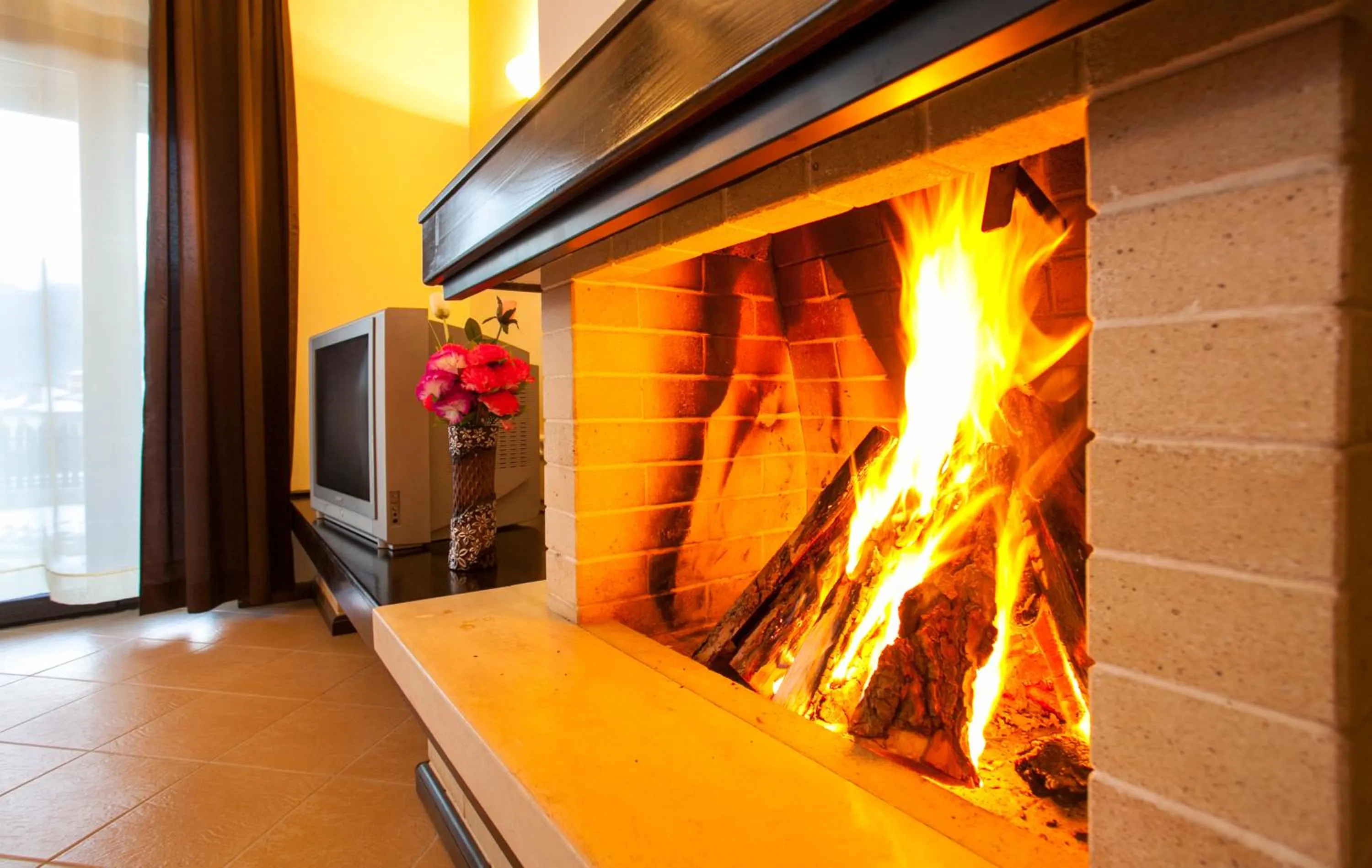 Communal lounge/ TV room in Holiday Village COOP Dobrinishte