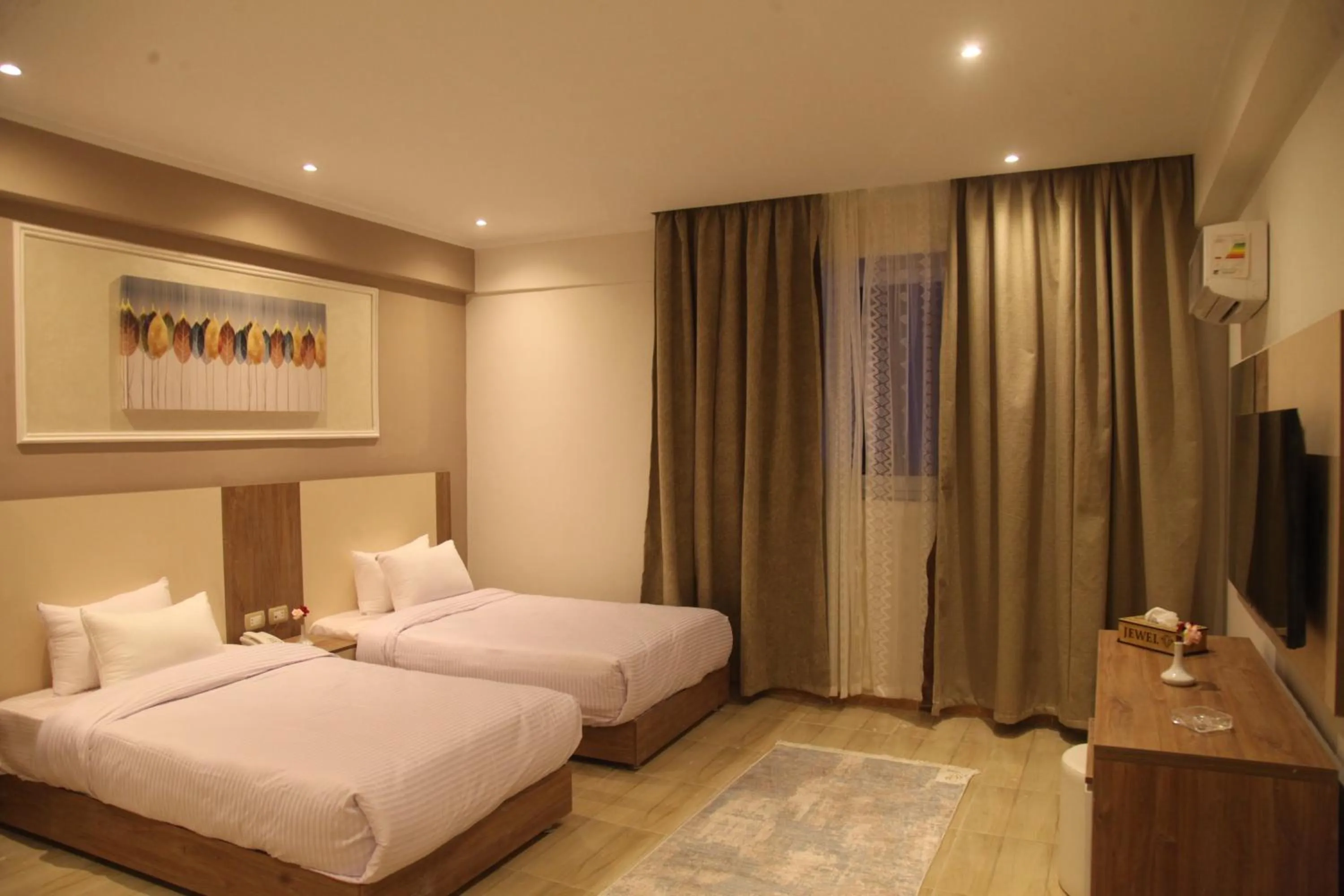 Bed in Jewel Assiut Hotel