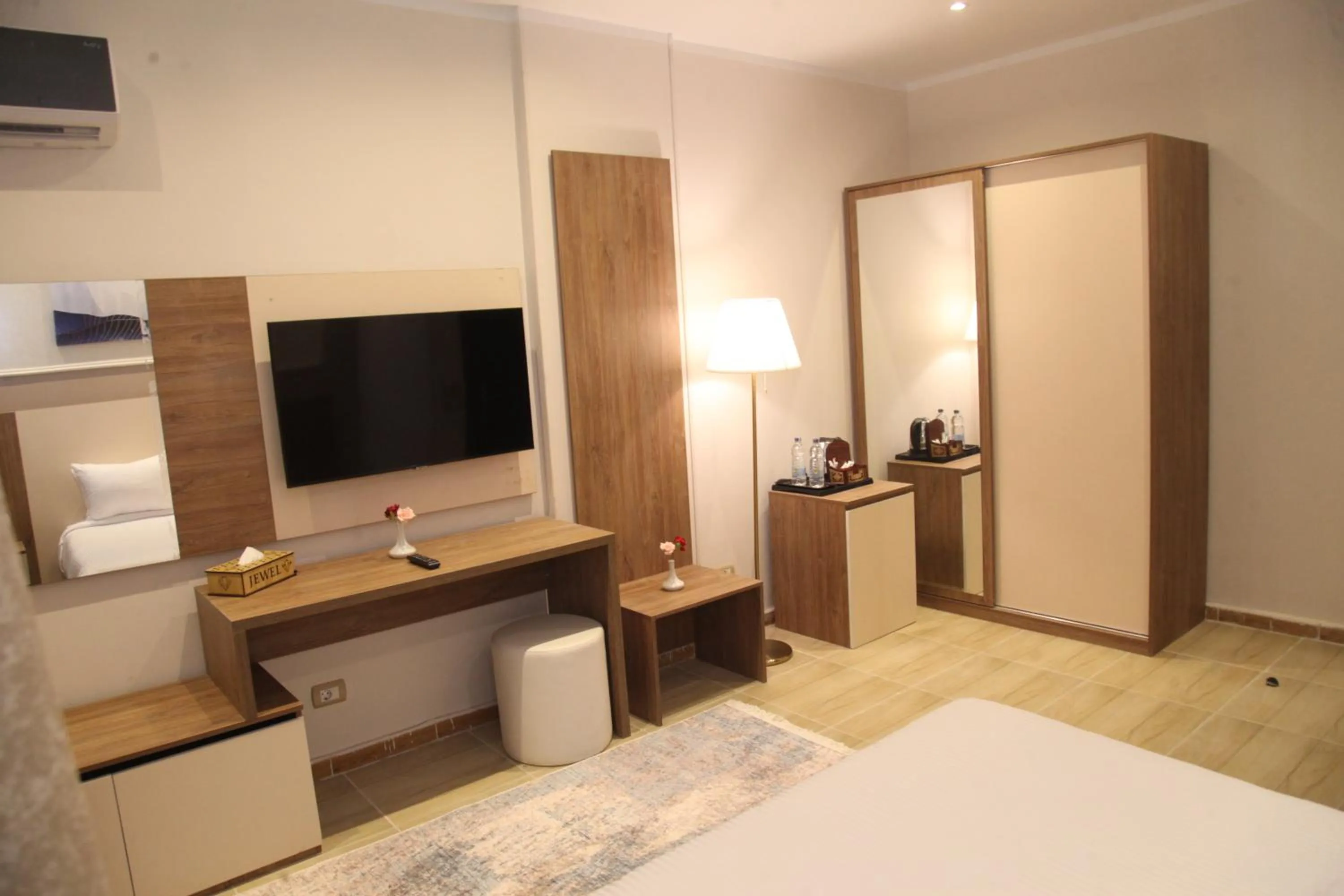 TV and multimedia, Bed in Jewel Assiut Hotel