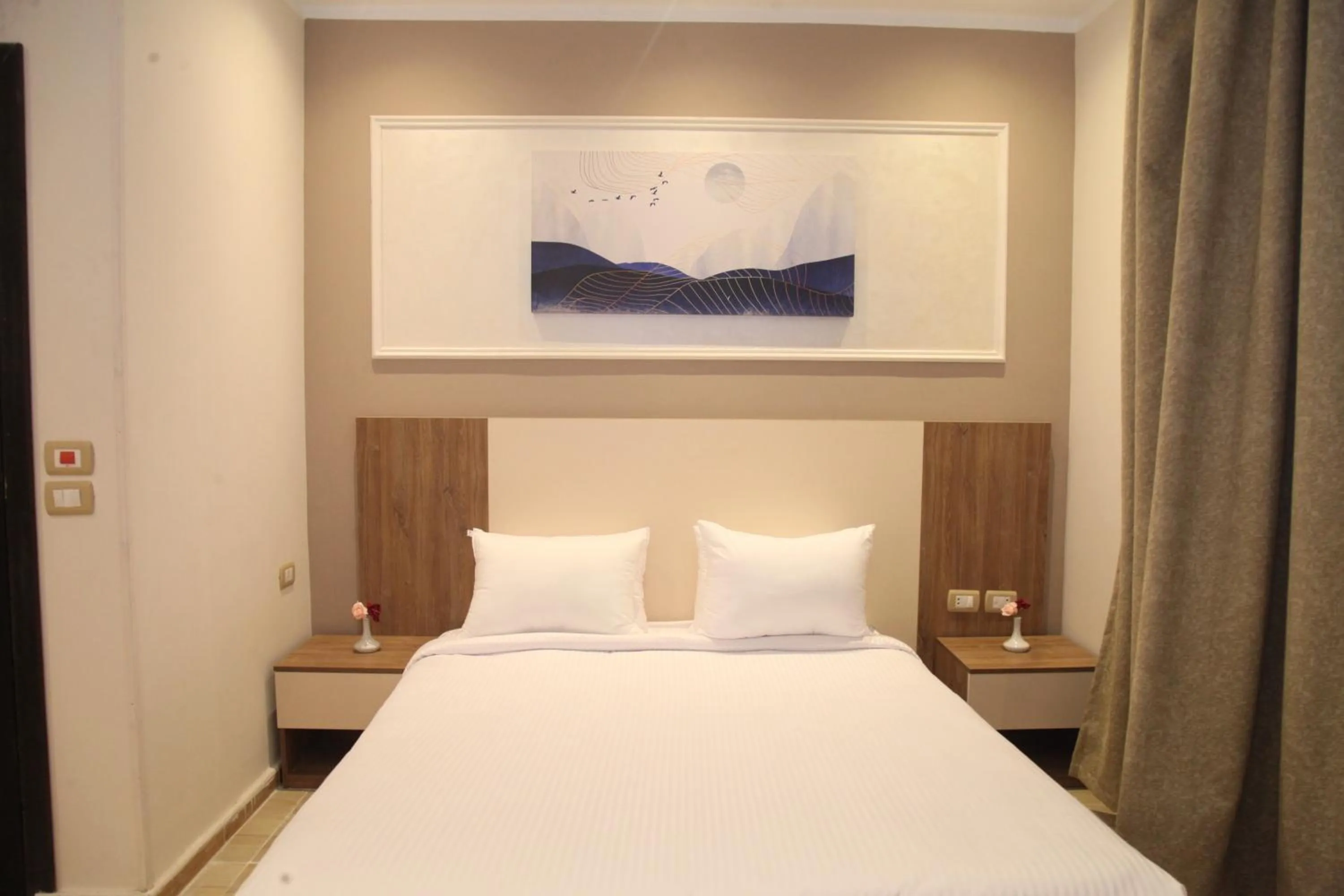 Bed in Jewel Assiut Hotel