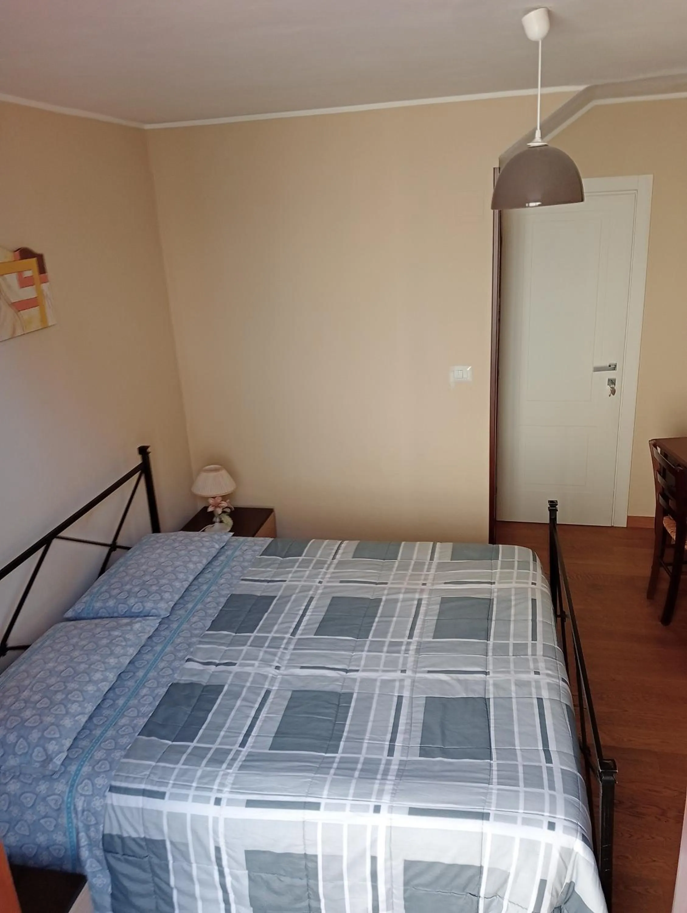 Bed in San Nicolò Holiday Home