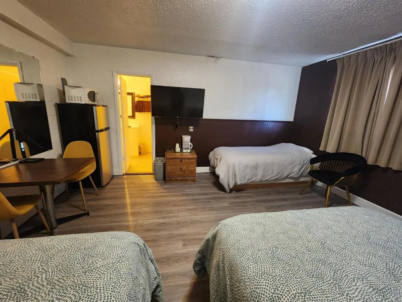 Bed in Centennial Motel