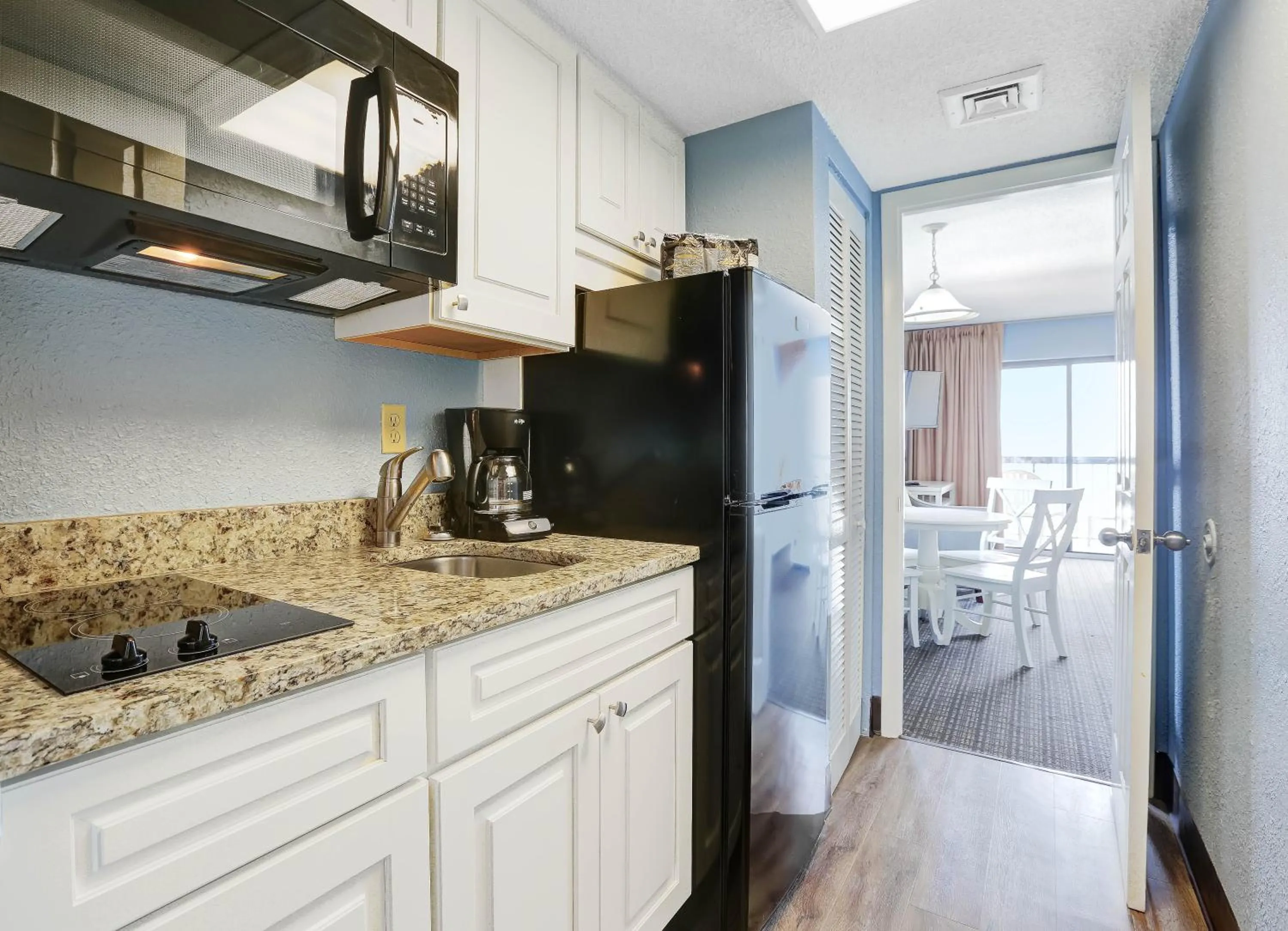 Kitchen or kitchenette in Sand Dunes Tower Suites and Villas